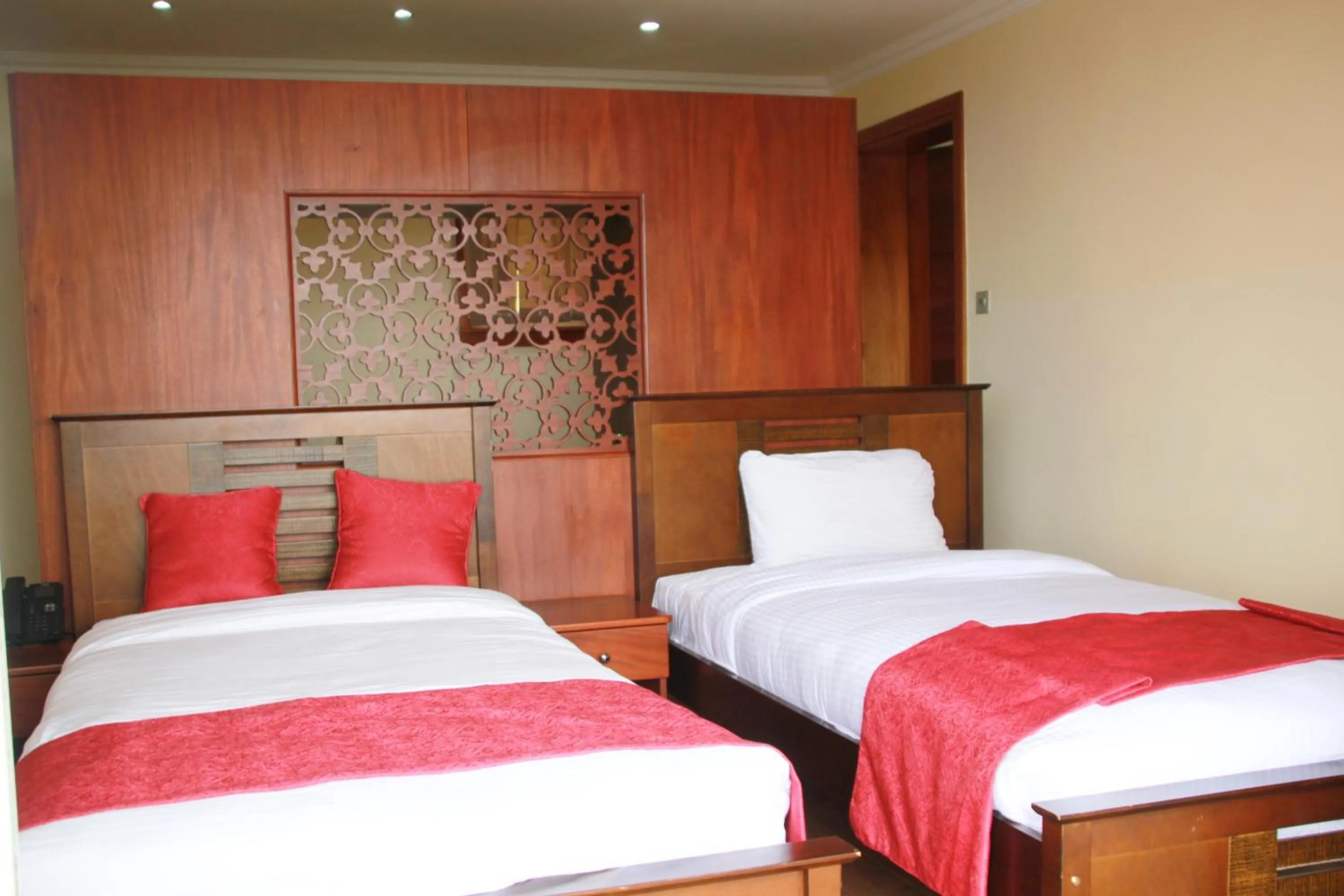 Bed in Lake Elementaita Mountain Lodge