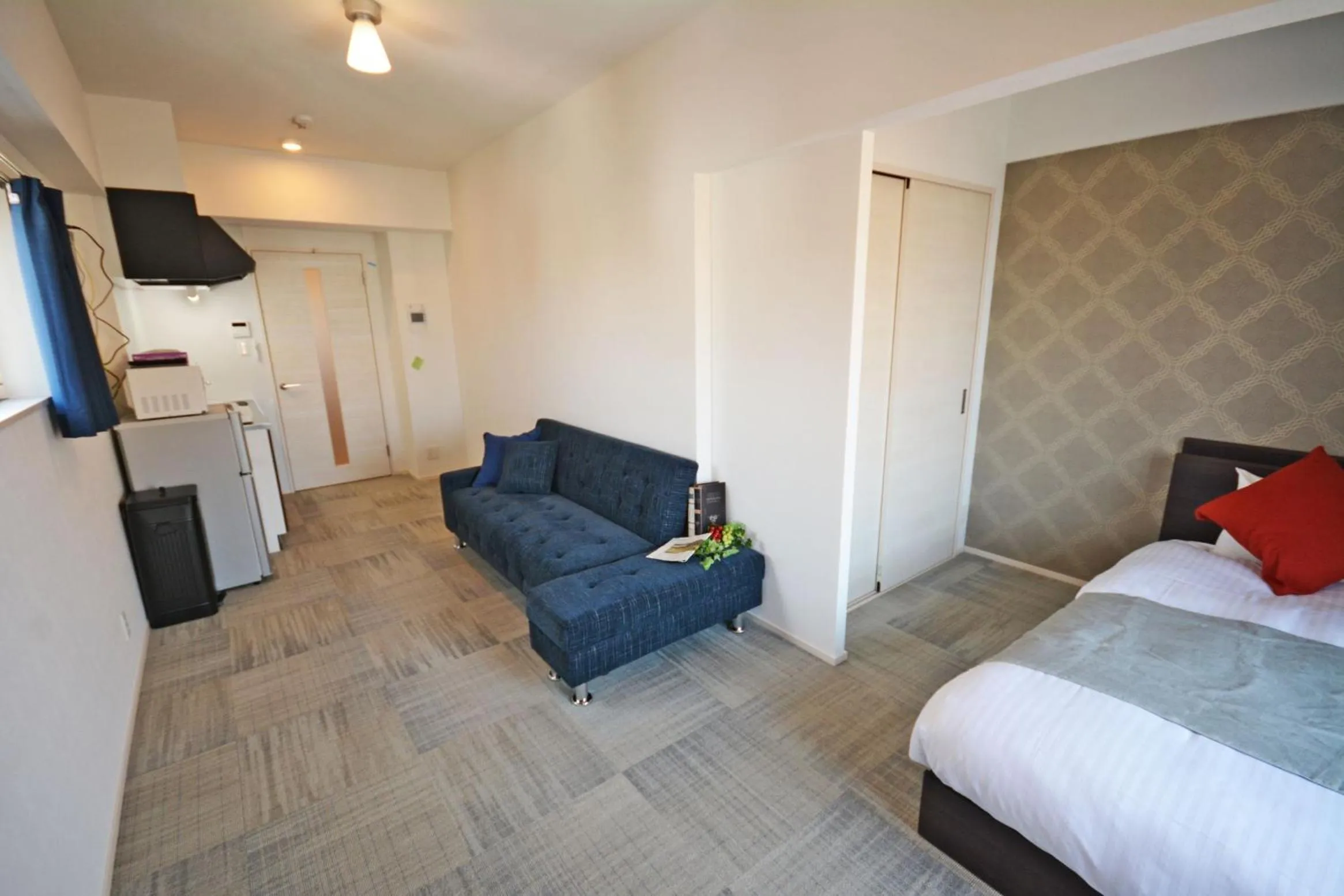 Photo of the whole room, Bed in The Grand Residence Hotel Tenjin