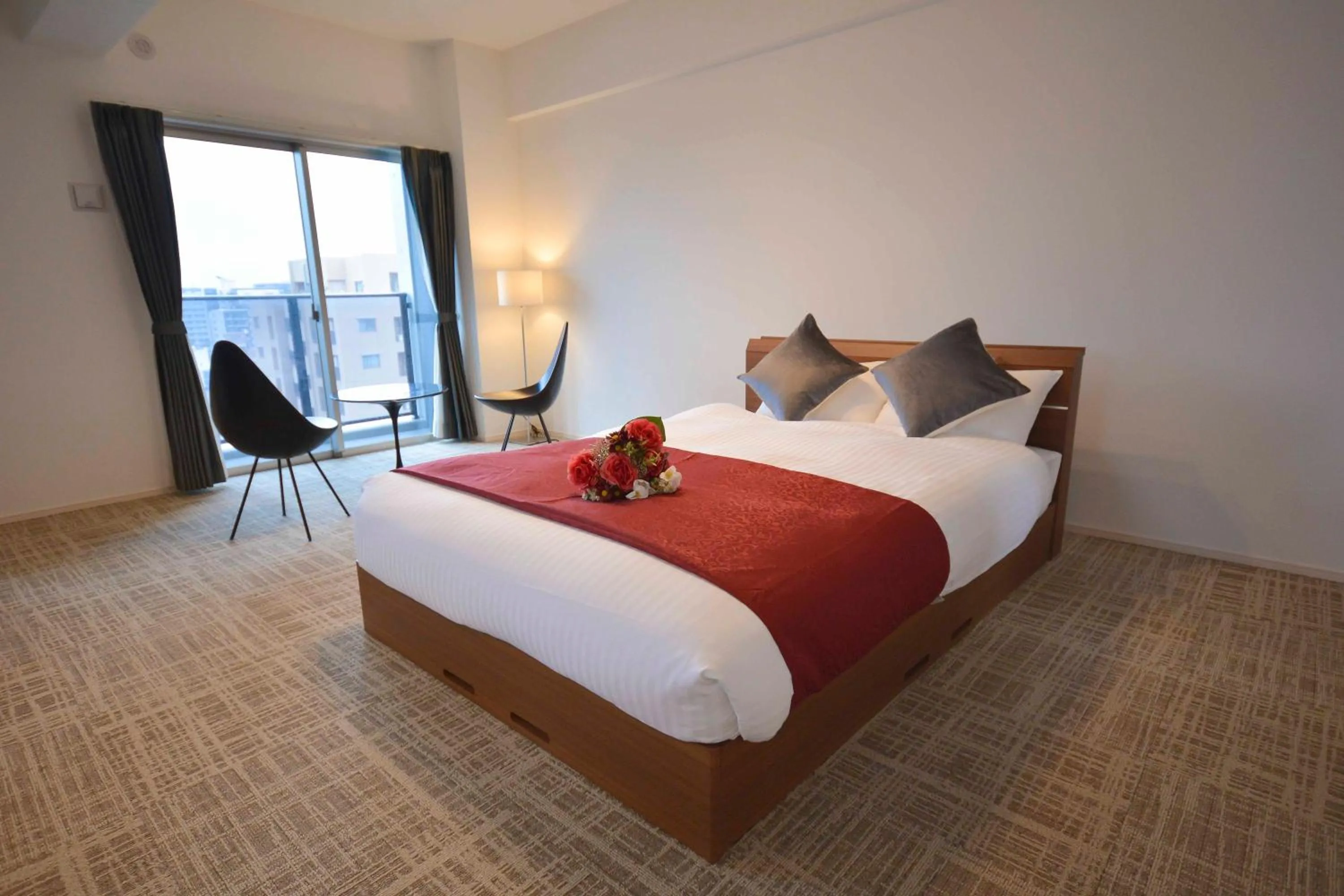 Photo of the whole room, Bed in The Grand Residence Hotel Tenjin