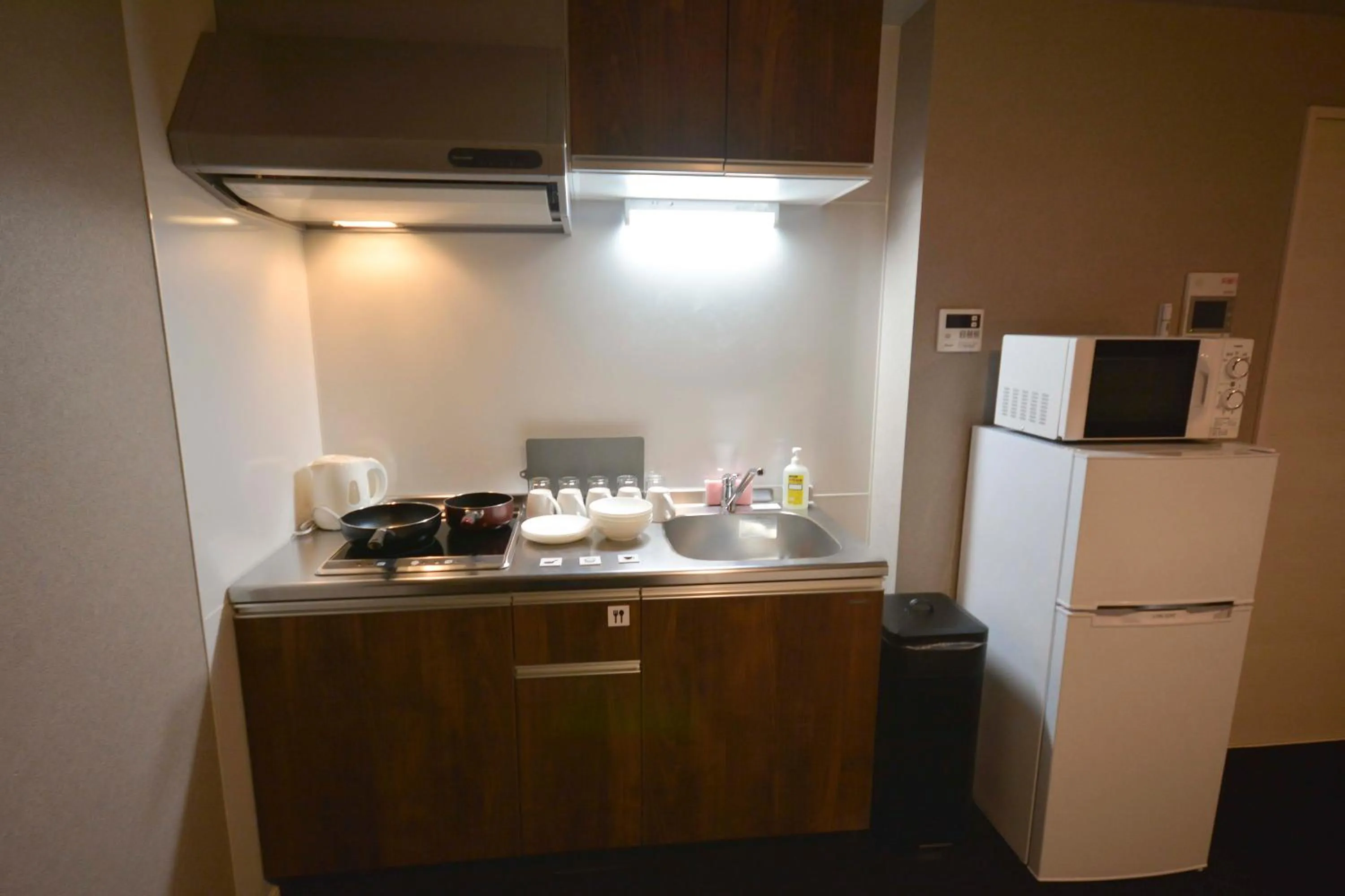 Kitchen or kitchenette in The Grand Residence Hotel Tenjin