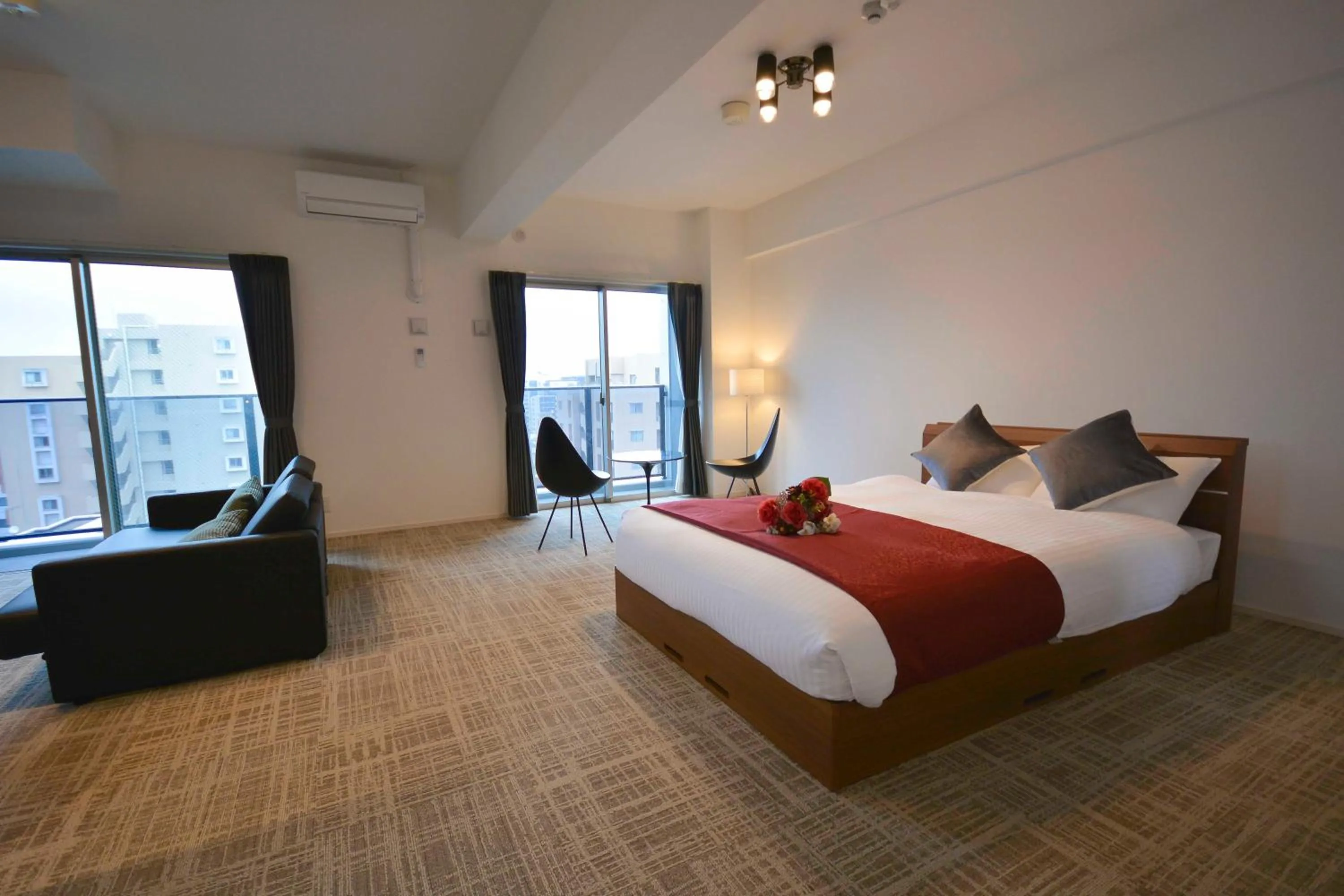 Photo of the whole room, Bed in The Grand Residence Hotel Tenjin