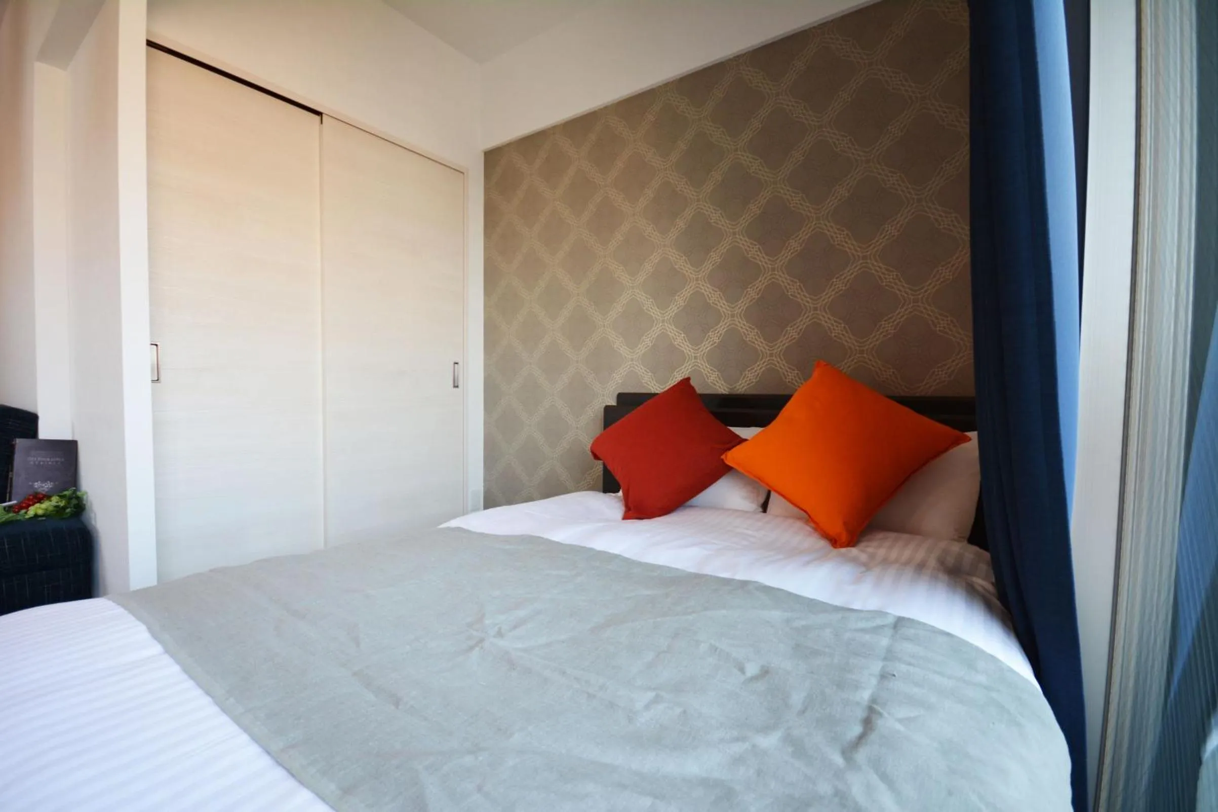 Photo of the whole room, Bed in The Grand Residence Hotel Tenjin