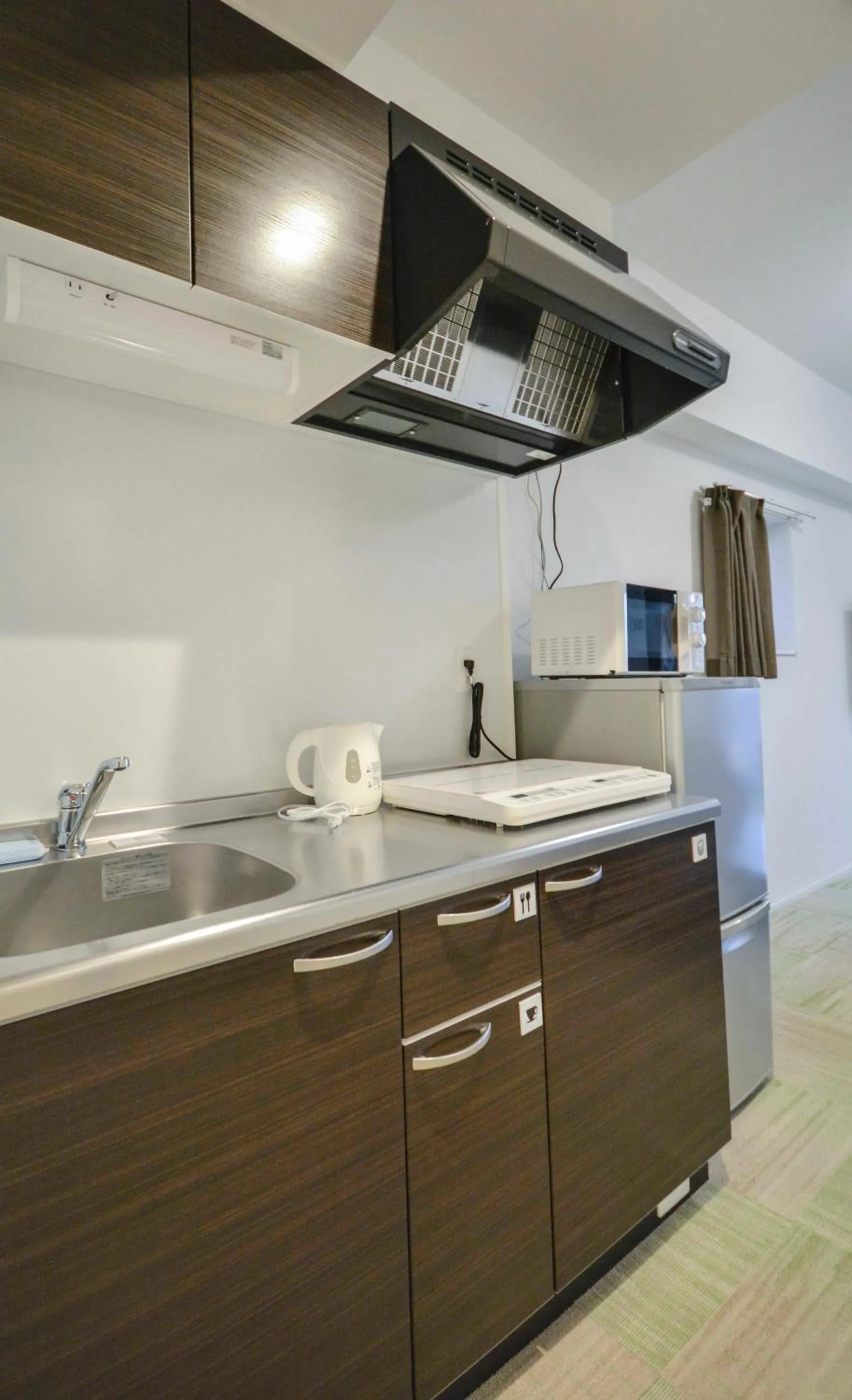 Kitchen or kitchenette in The Grand Residence Hotel Tenjin