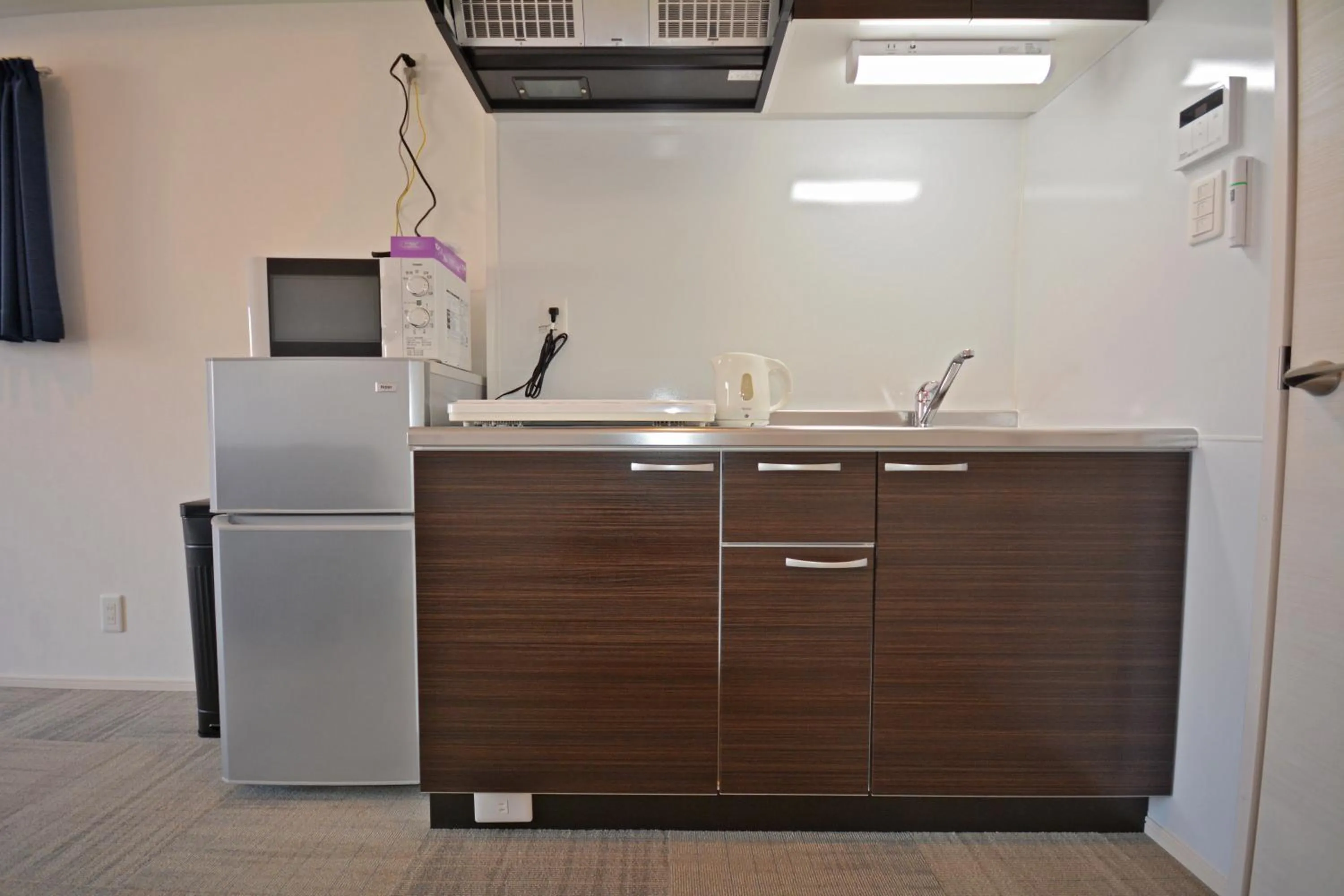 Kitchen or kitchenette in The Grand Residence Hotel Tenjin