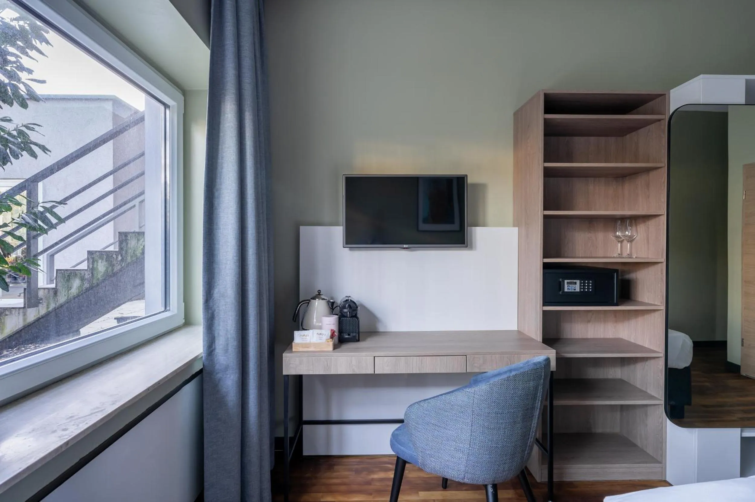 Seating area, Bed in Numa Bona