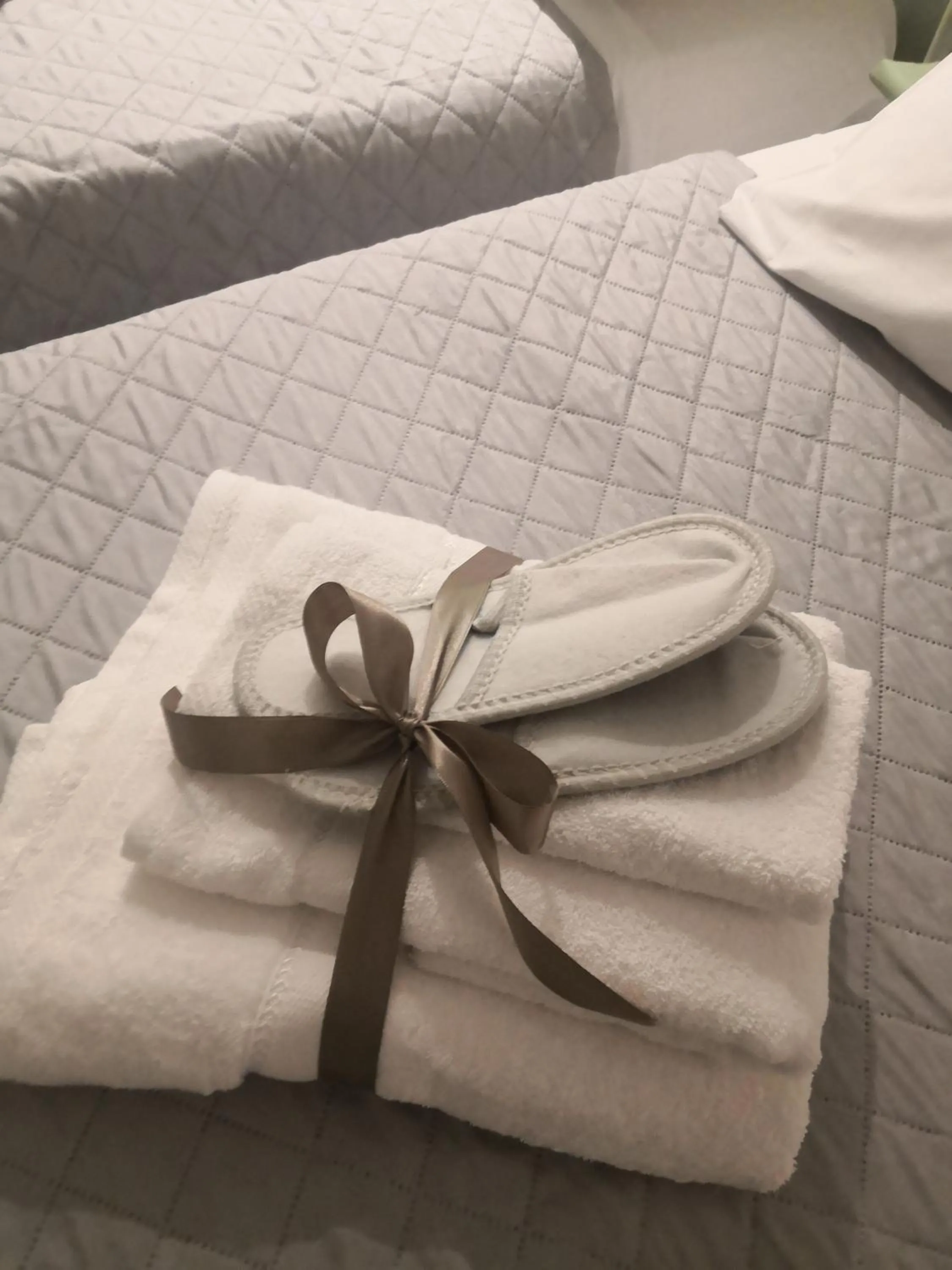 towels, Bed in B&B Villa Lilla