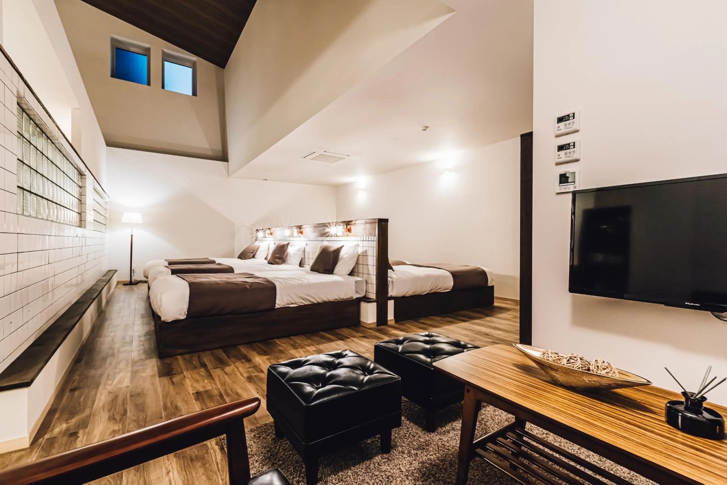 Living room, Bed in Yamahana Onsen Tonden Japanese Inn