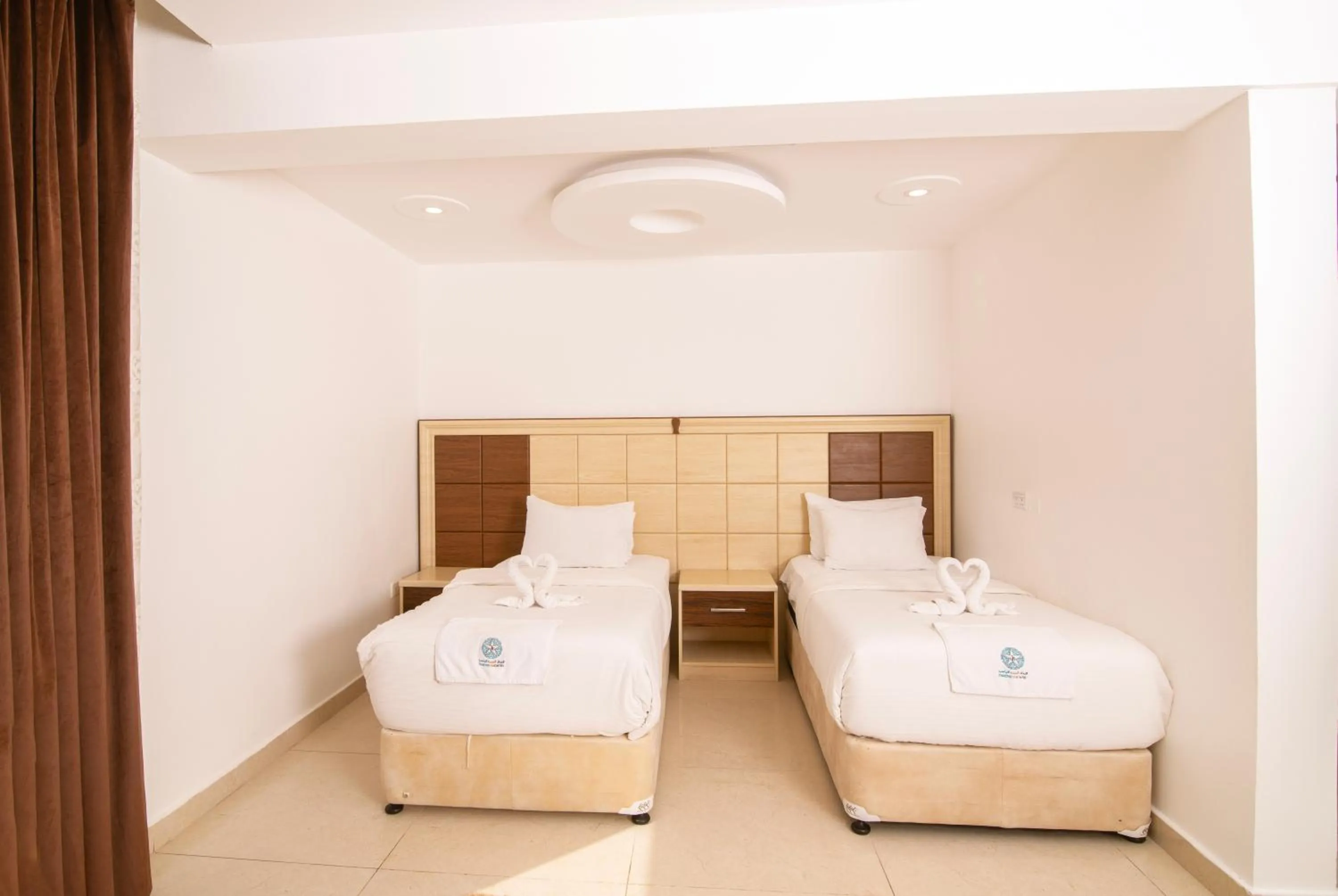 Bed in Diamond Star Hotel فندق النجمة الماسية