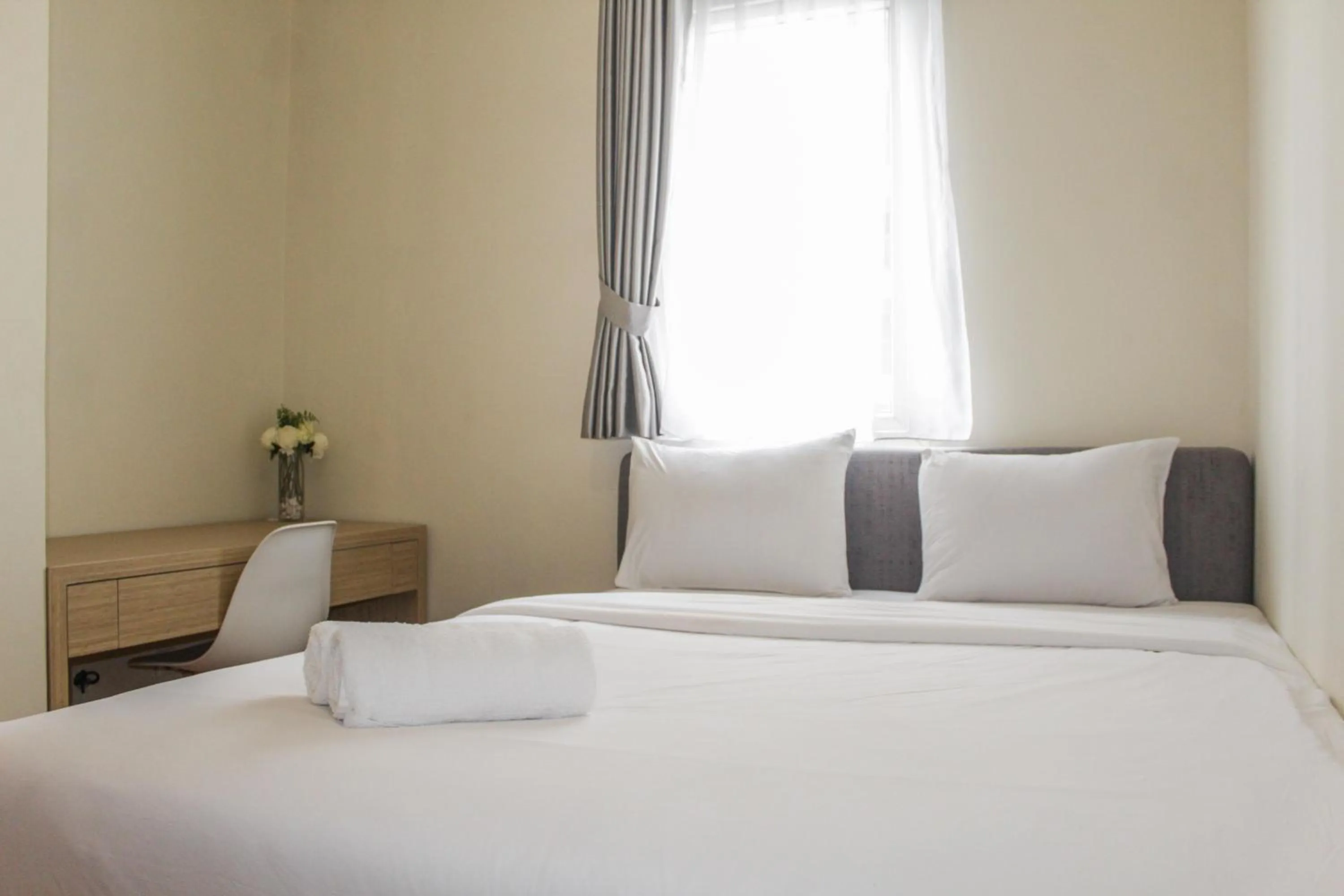 Bedroom, Bed in Homey 2BR Apartment at Grand Palace Kemayoran By Travelio