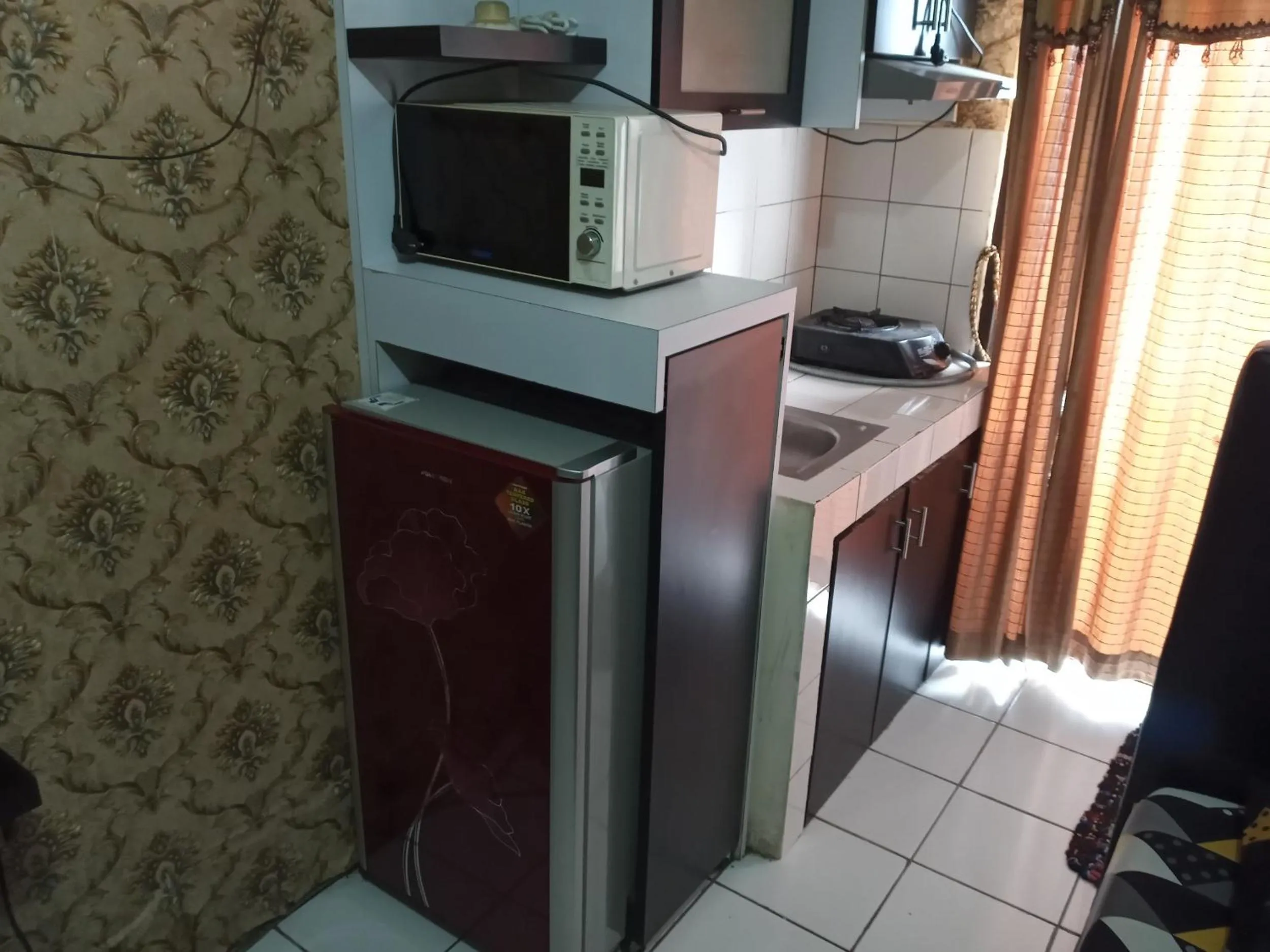 Kitchen or kitchenette in Adhigana Property Kemang View