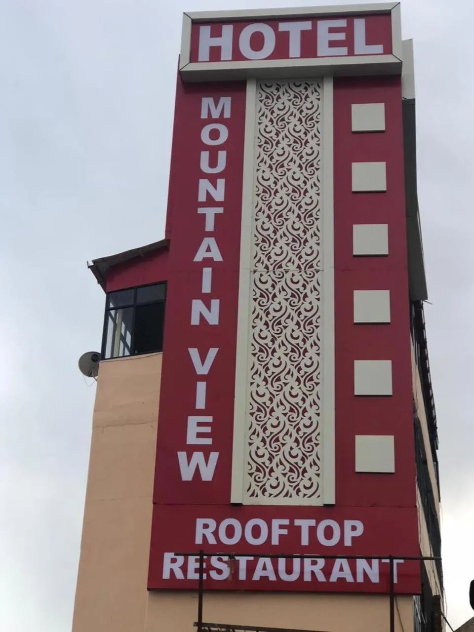 Property building in Hotel Mountain View And Rooftop Restaurant
