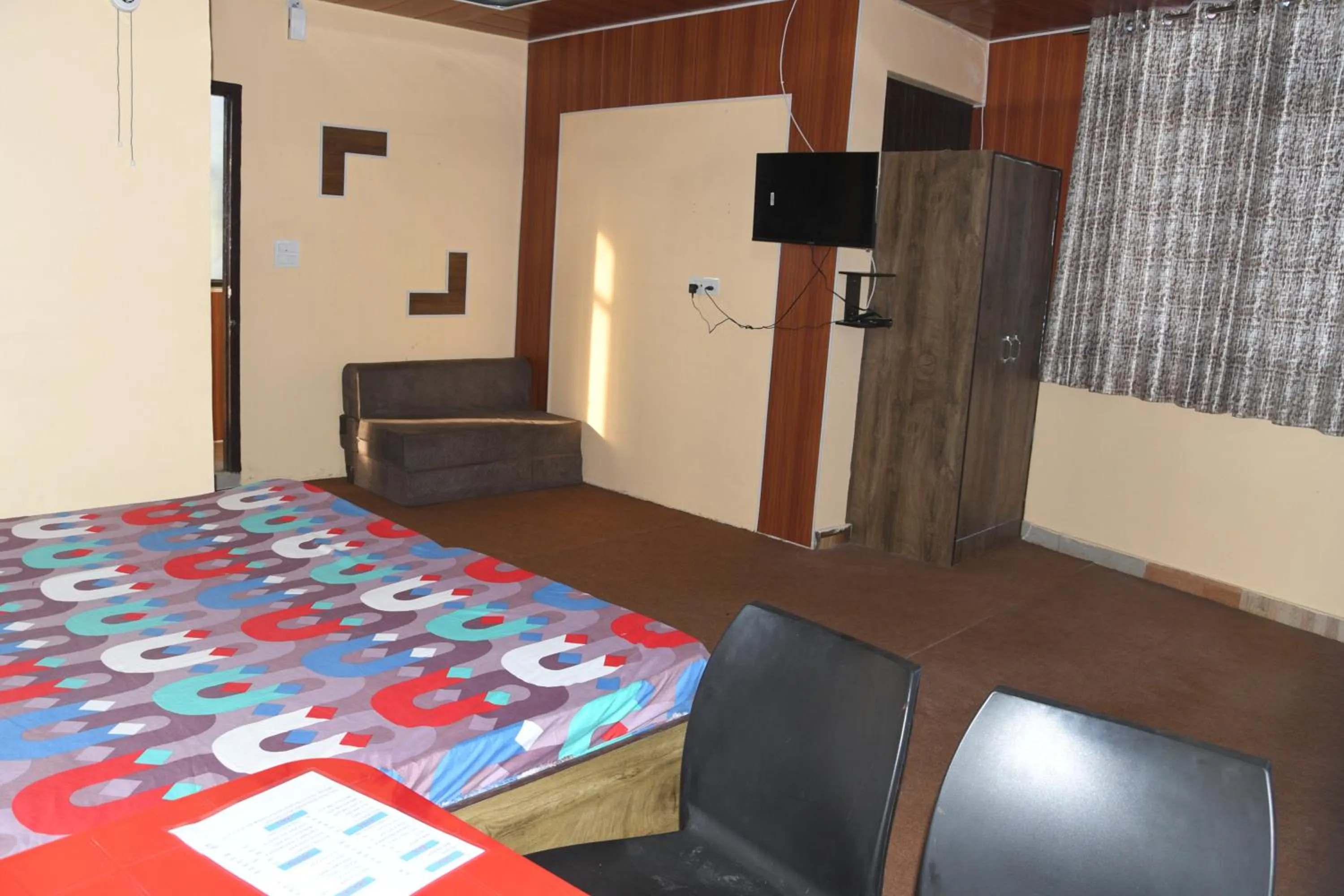 Bed in Hotel Mountain View And Rooftop Restaurant