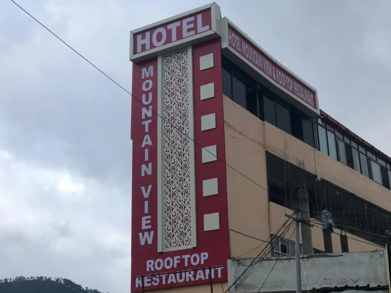 Property building in Hotel Mountain View And Rooftop Restaurant