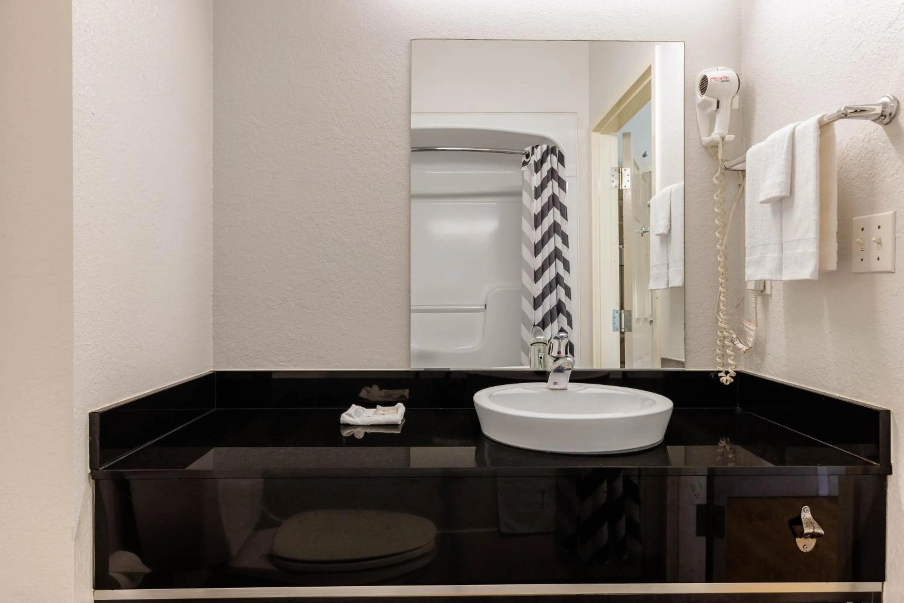 Bathroom in Studio 6 Toronto - Mississauga with Kitchenettes