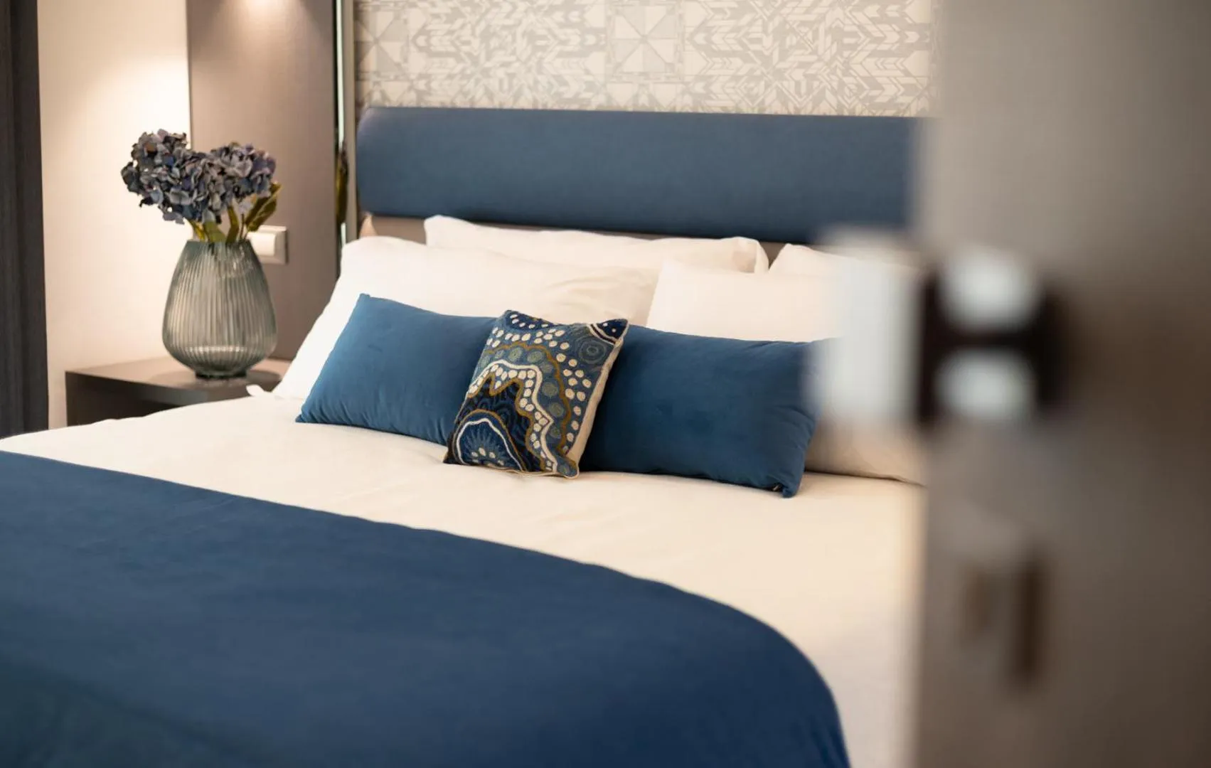 Bed in Romagna Suite Hotel