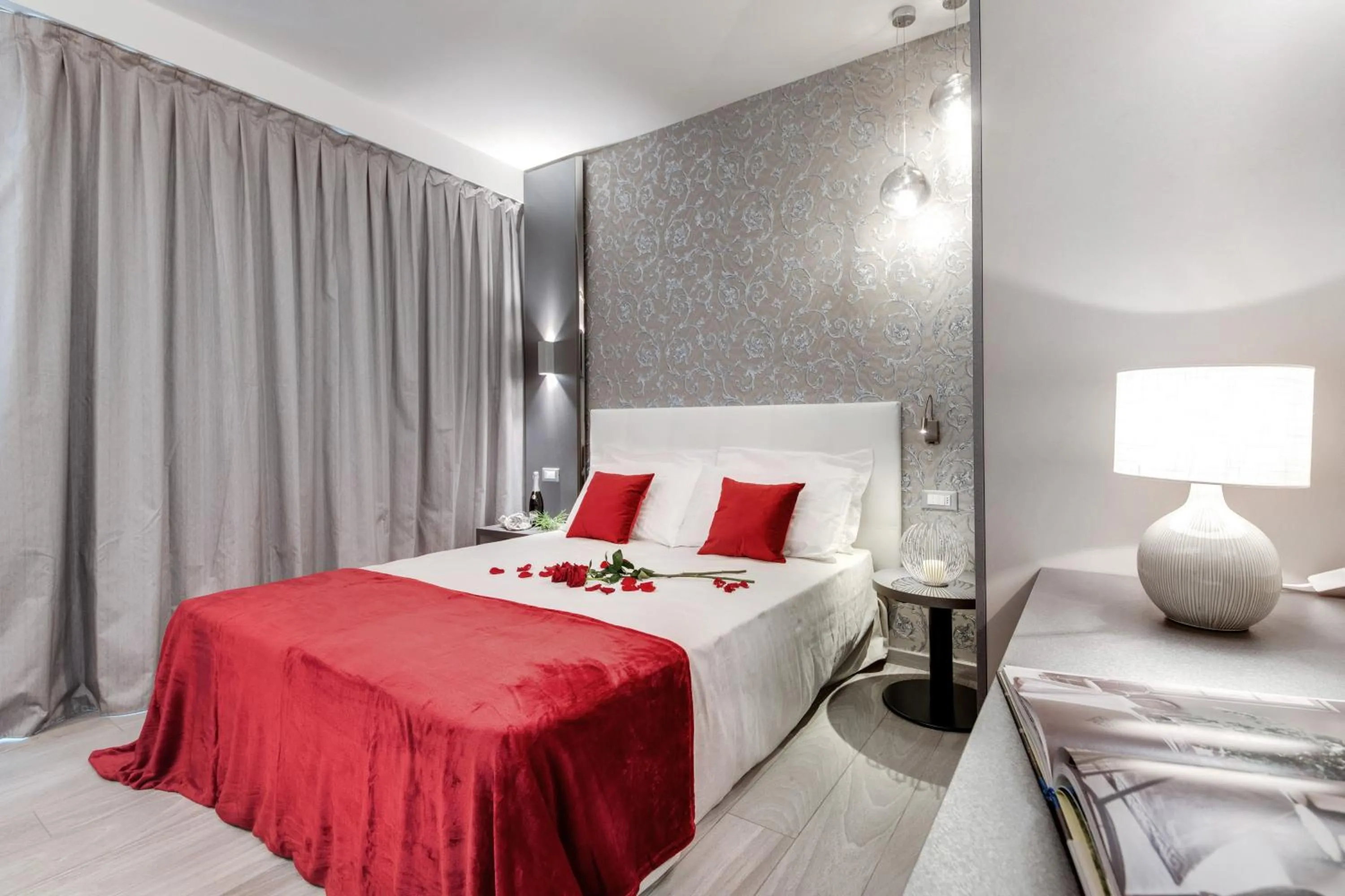 Bed in Romagna Suite Hotel