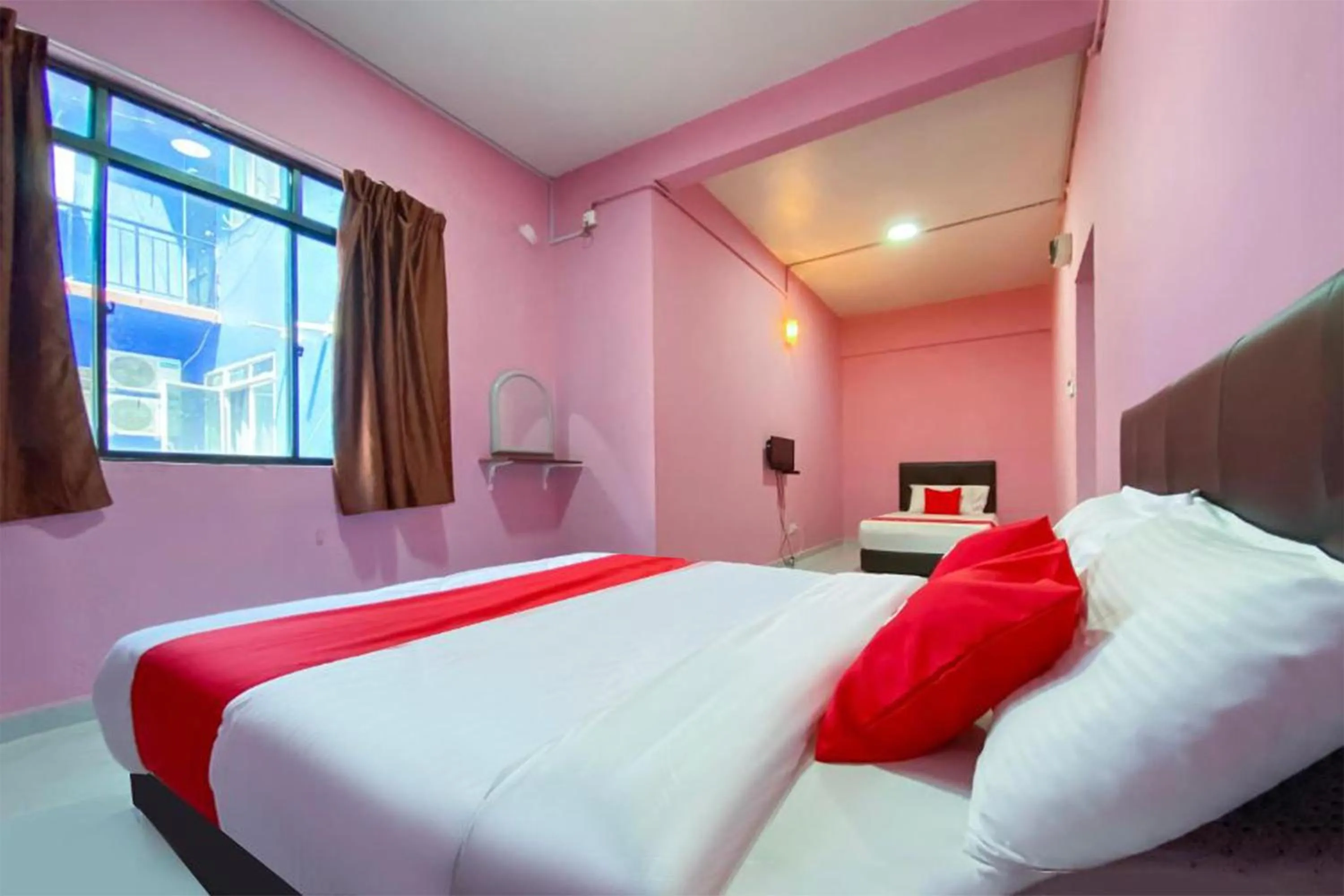 Bed in Coop Hotel Kangar