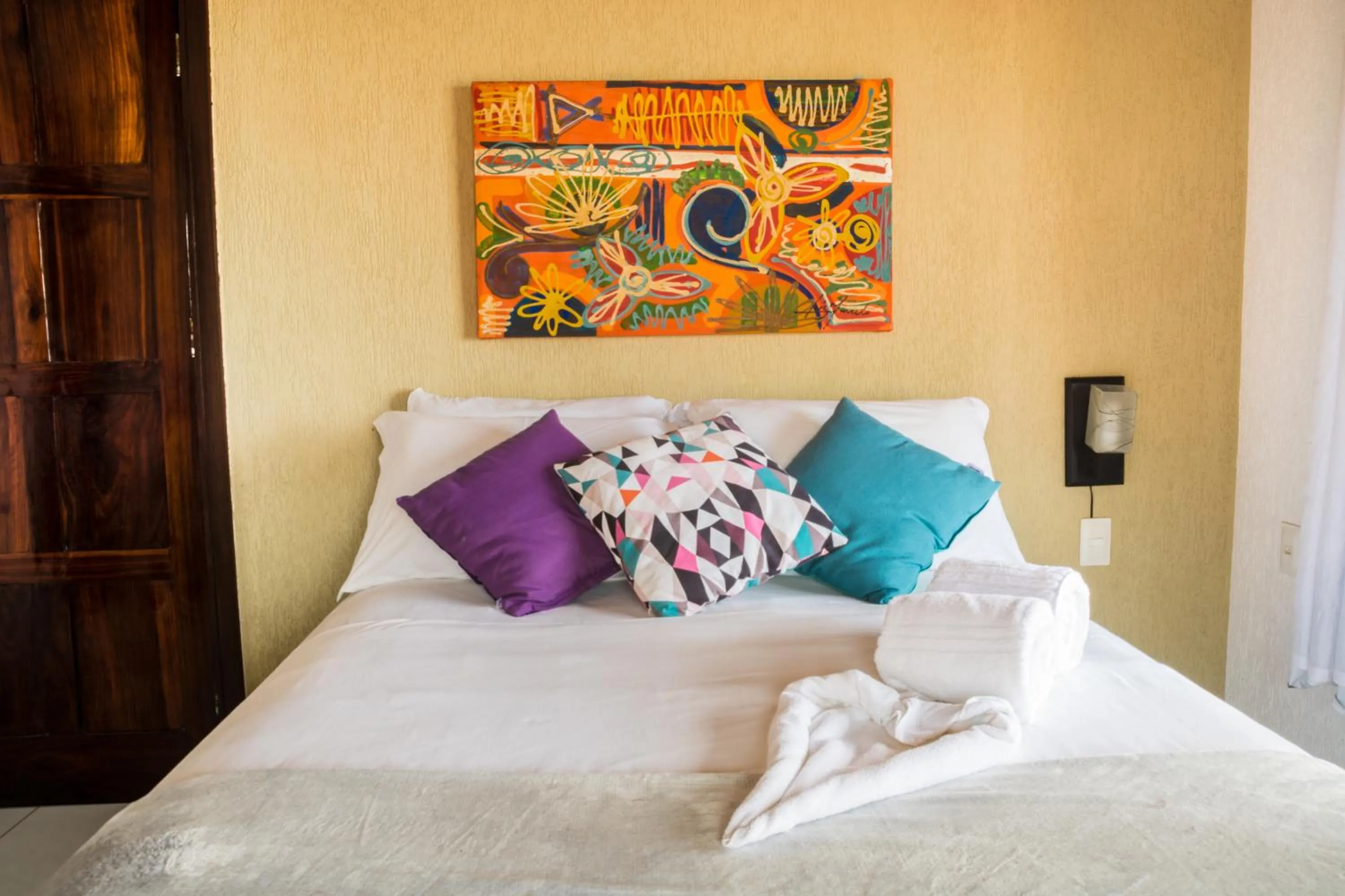 Bed in Pousada Grauçá