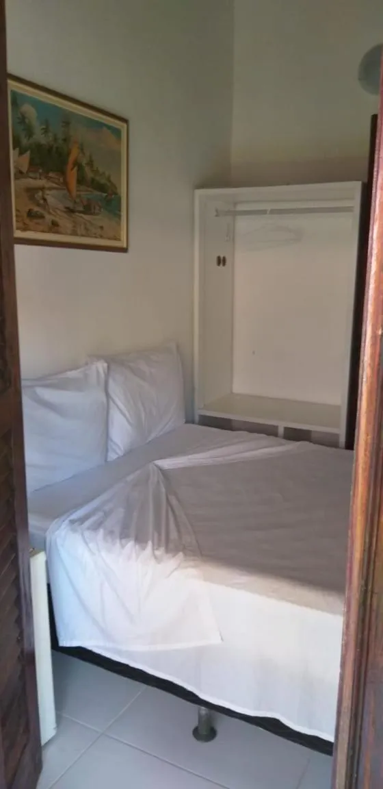 Bed in Pousada Grauçá