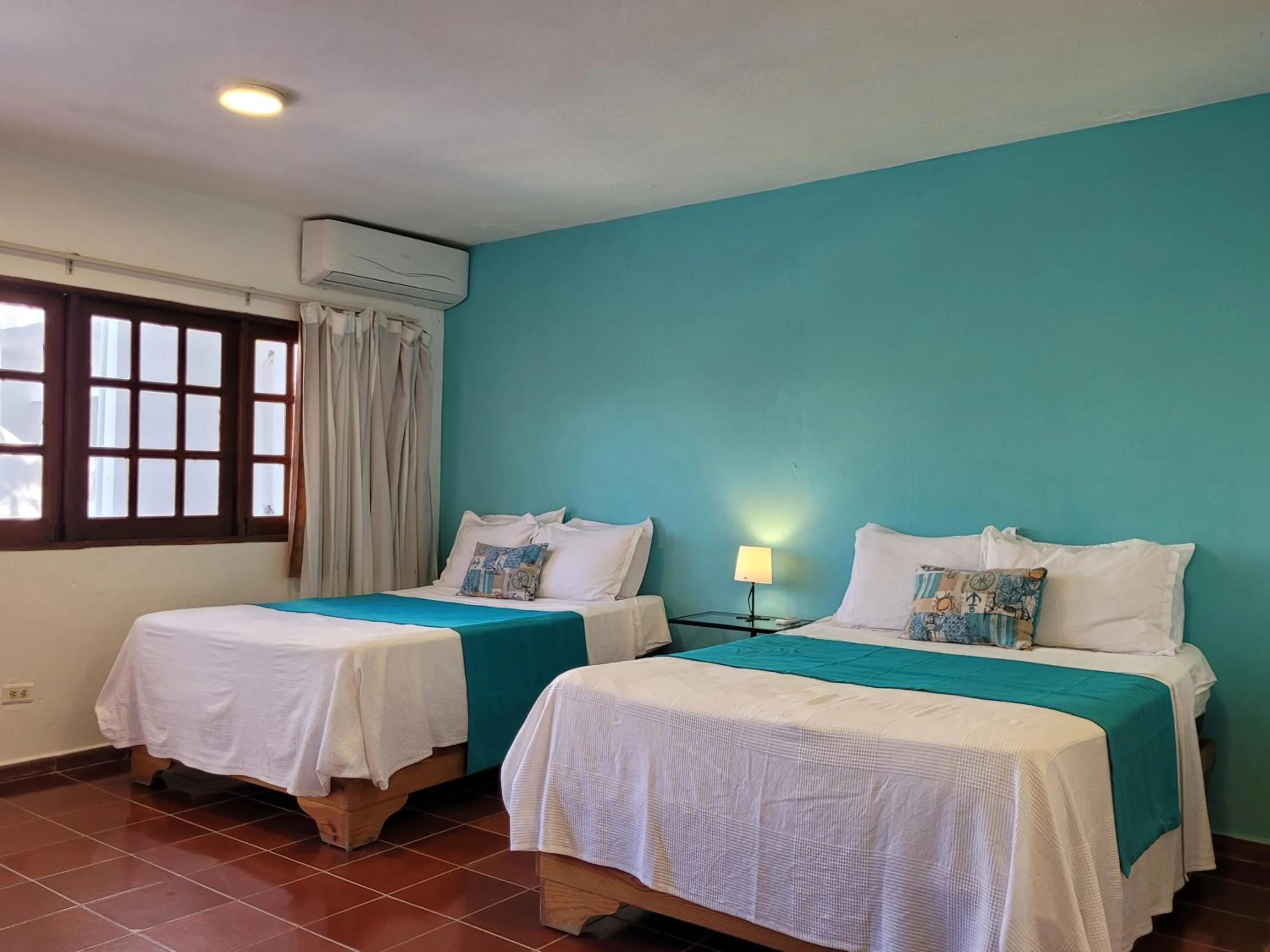 Bed in Calypso Beach Hotel
