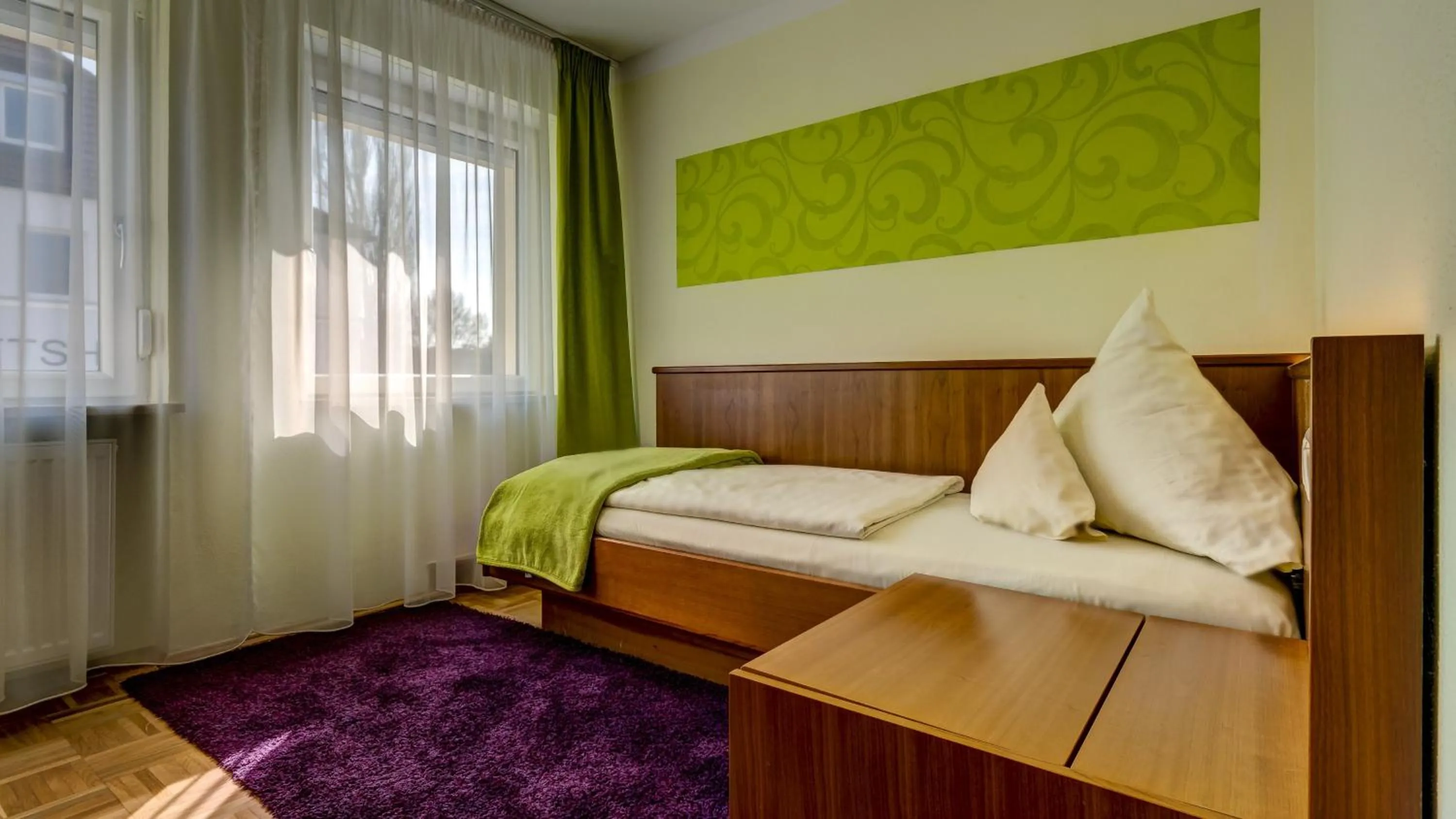 Bed in Hotel Restaurant Weihenstephaner Stuben