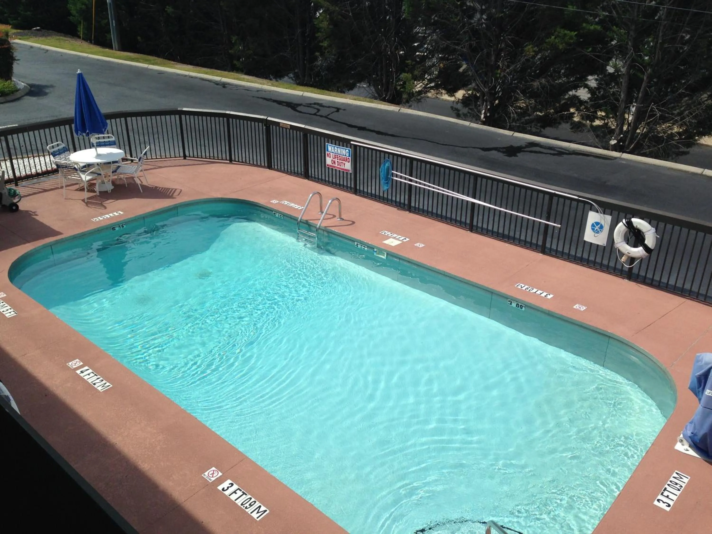 Swimming pool in Super 8 by Wyndham Calhoun