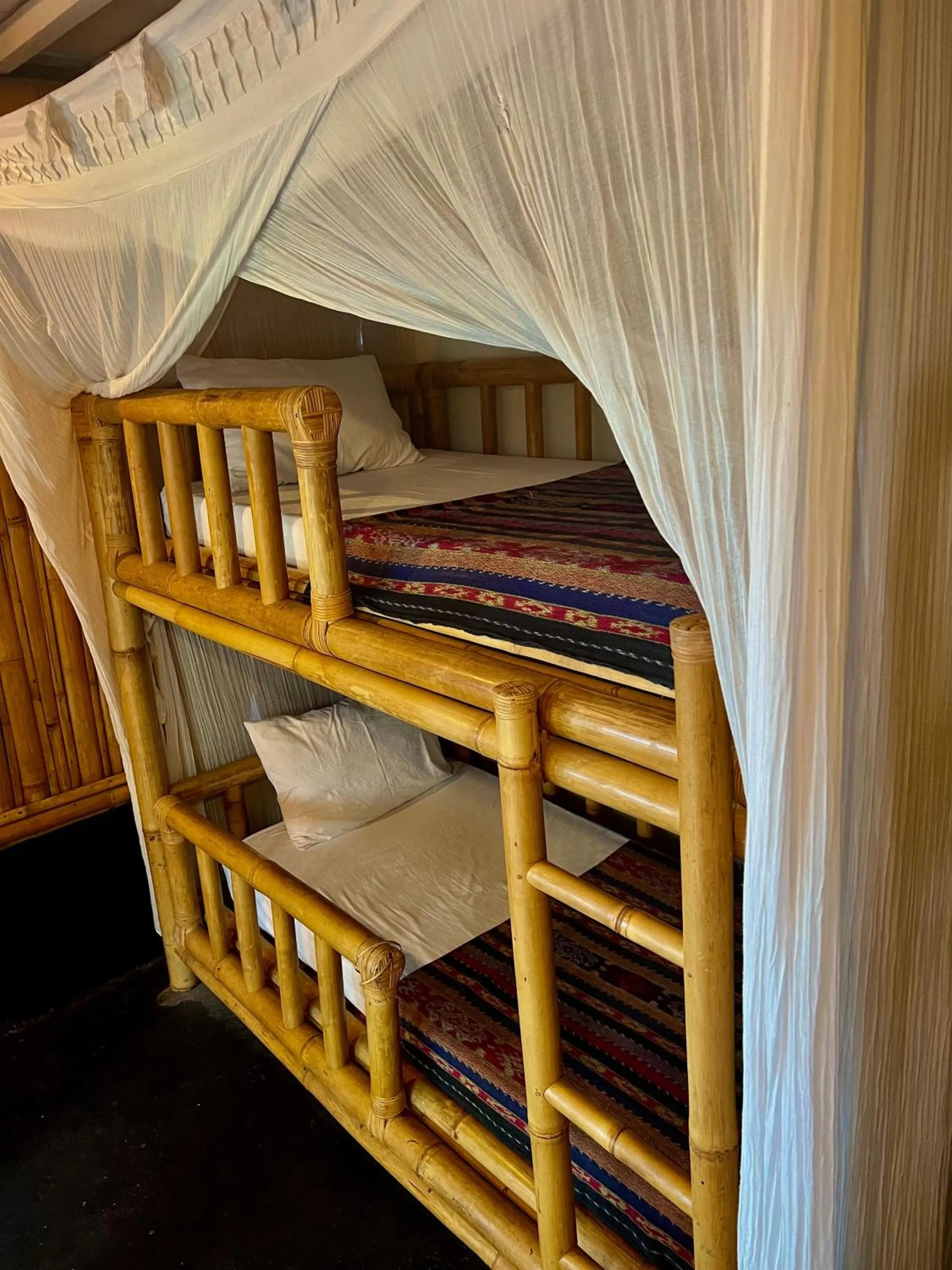 Bed in Rinjani Beach Eco Resort