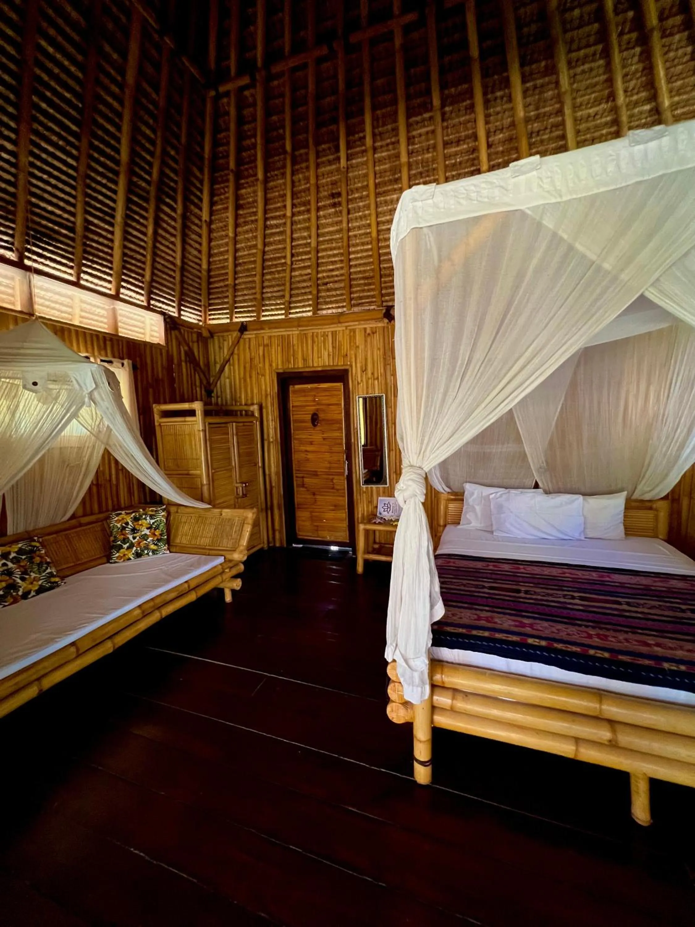 Bed in Rinjani Beach Eco Resort