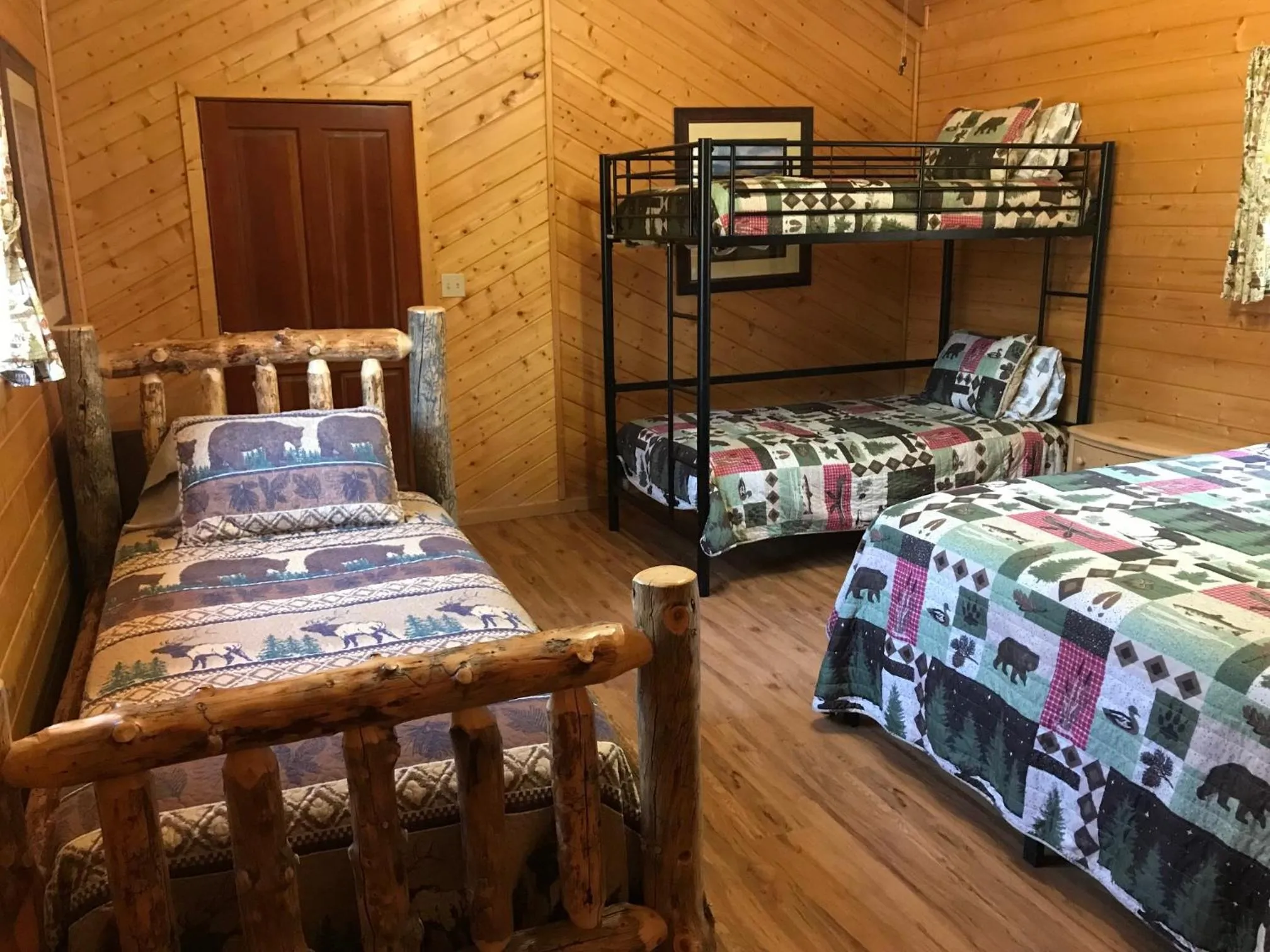 Bed in Grandview Cabins & RV Resort