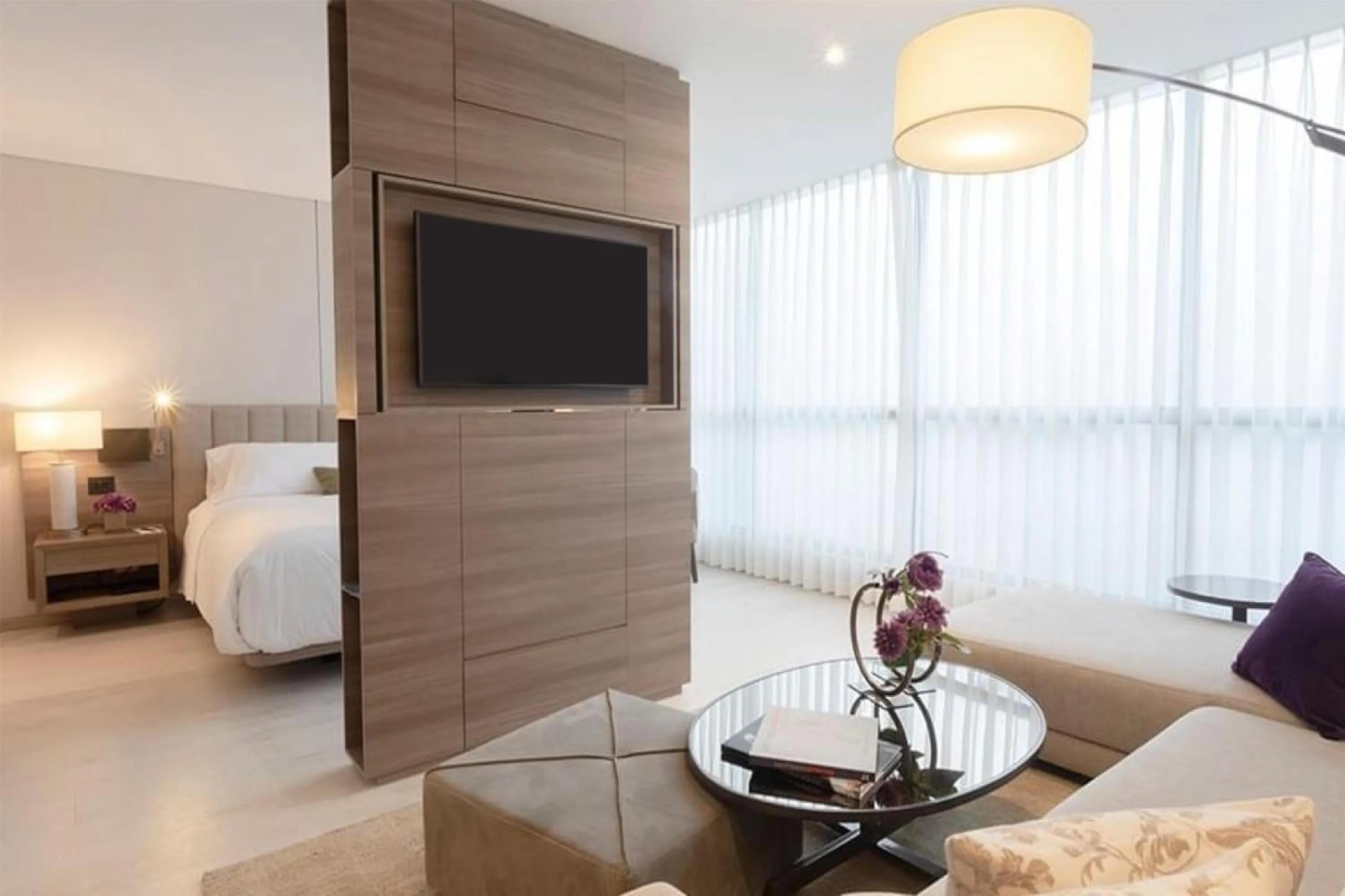 Living room, Bed in York Medellin, Curio Collection by Hilton