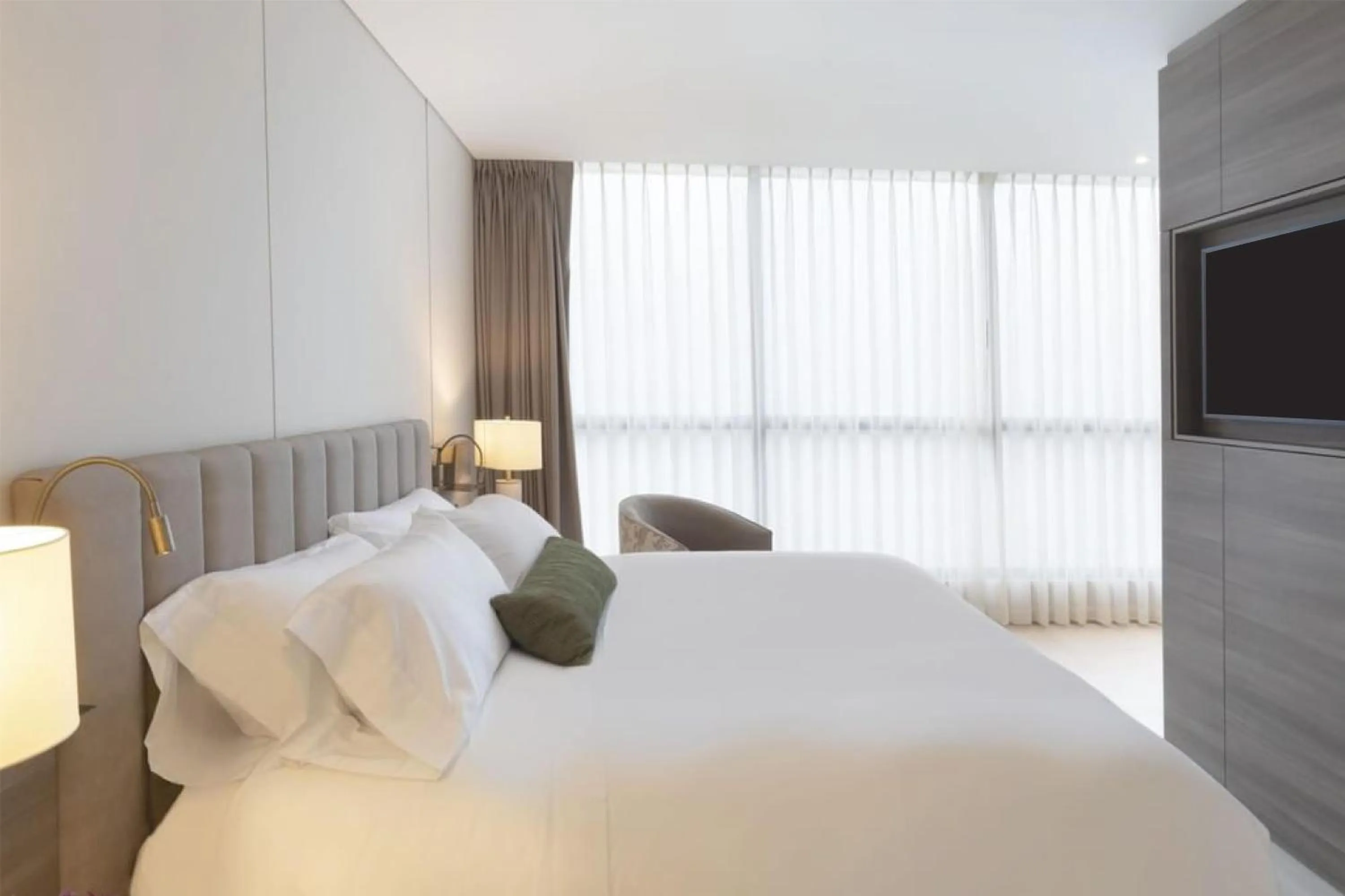 Bed in York Medellin, Curio Collection by Hilton