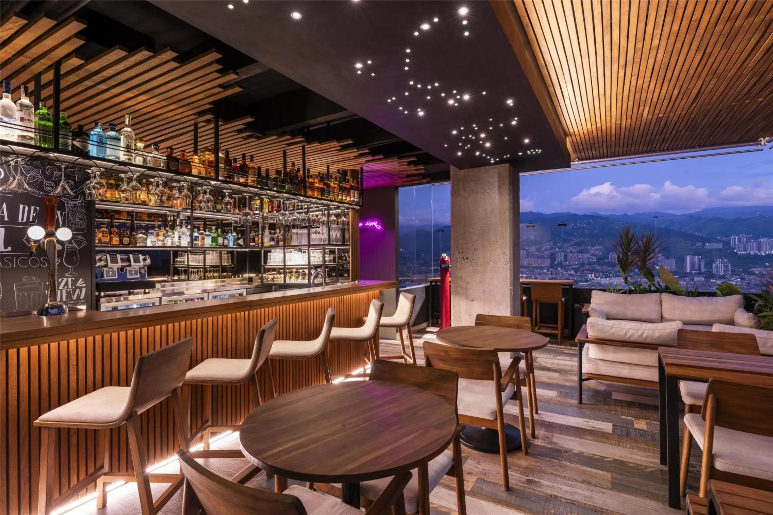 Lounge or bar in York Medellin, Curio Collection by Hilton
