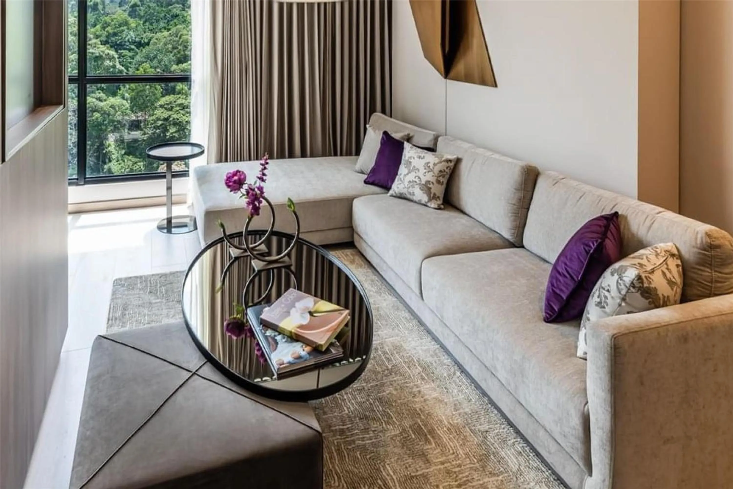 Living room in York Medellin, Curio Collection by Hilton