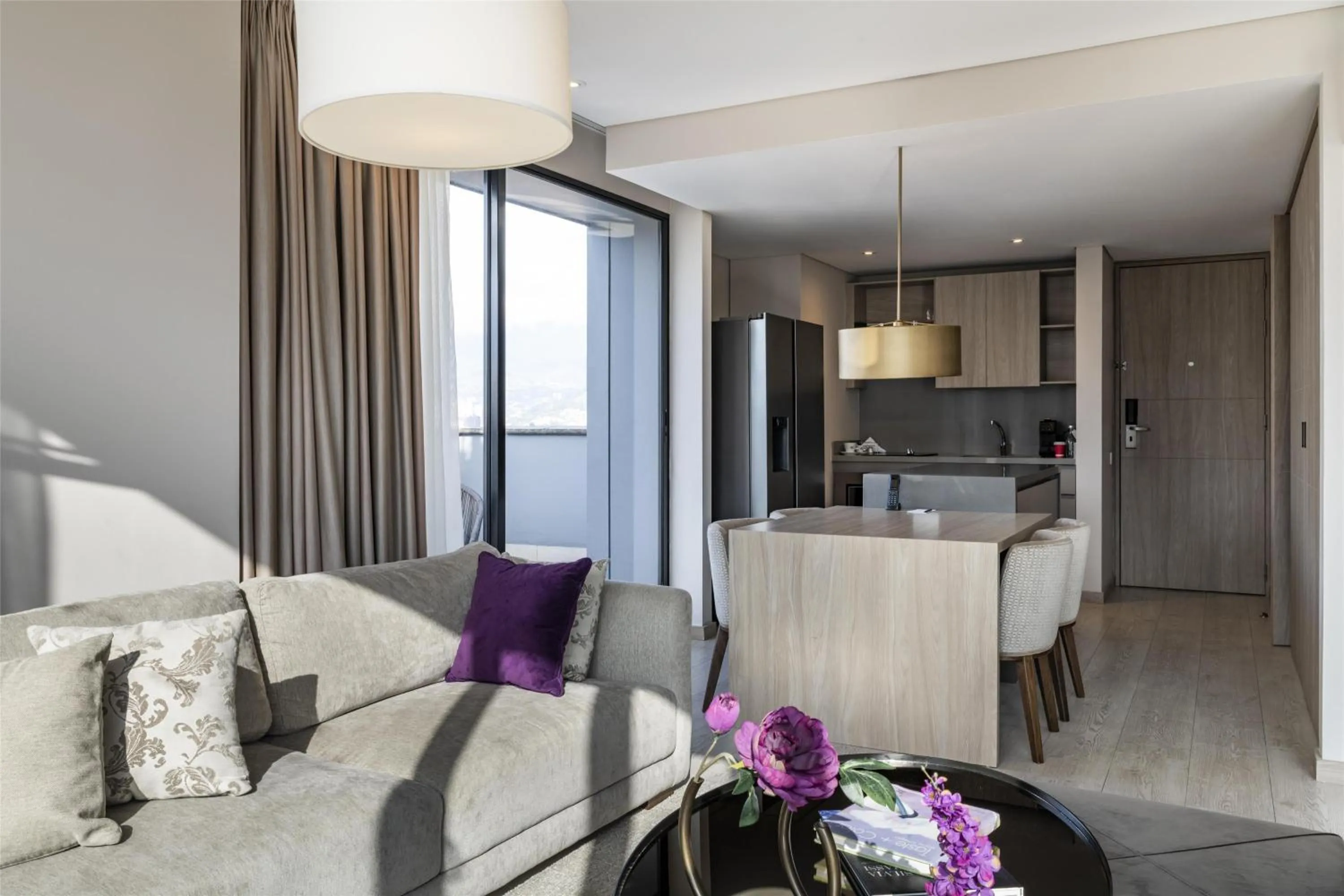 Living room in York Medellin, Curio Collection by Hilton