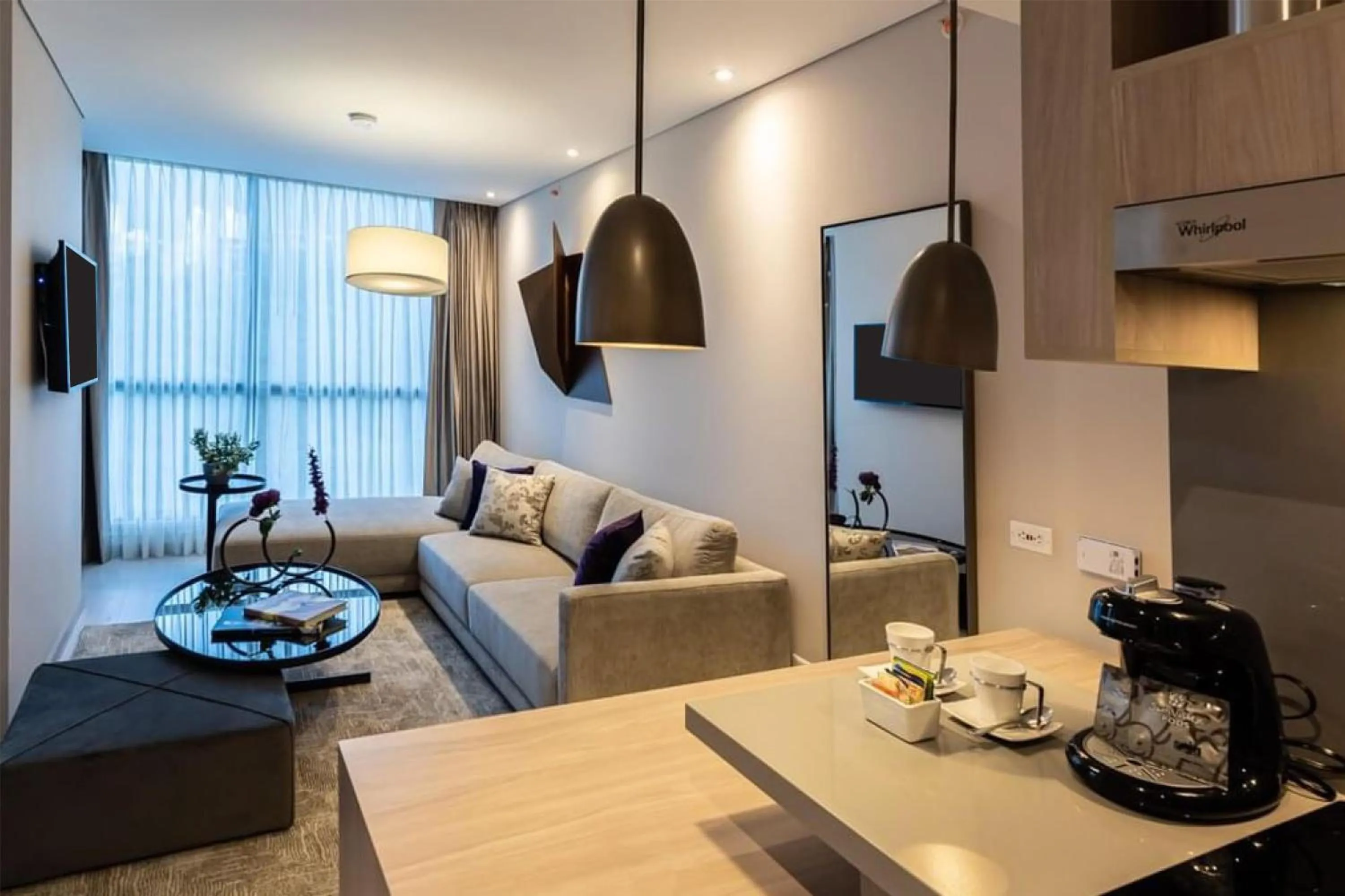 Living room in York Medellin, Curio Collection by Hilton