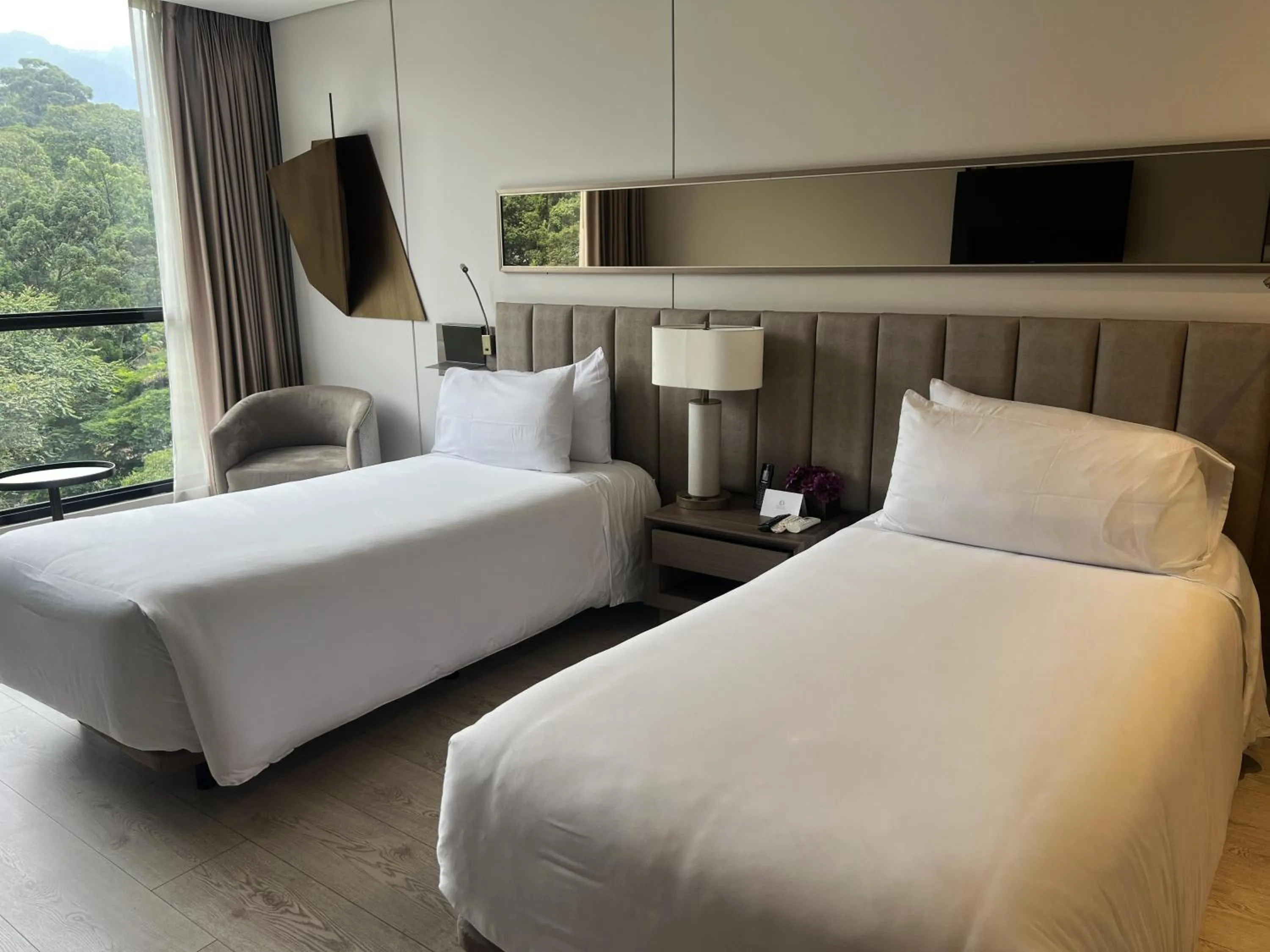 Bed in York Medellin, Curio Collection by Hilton