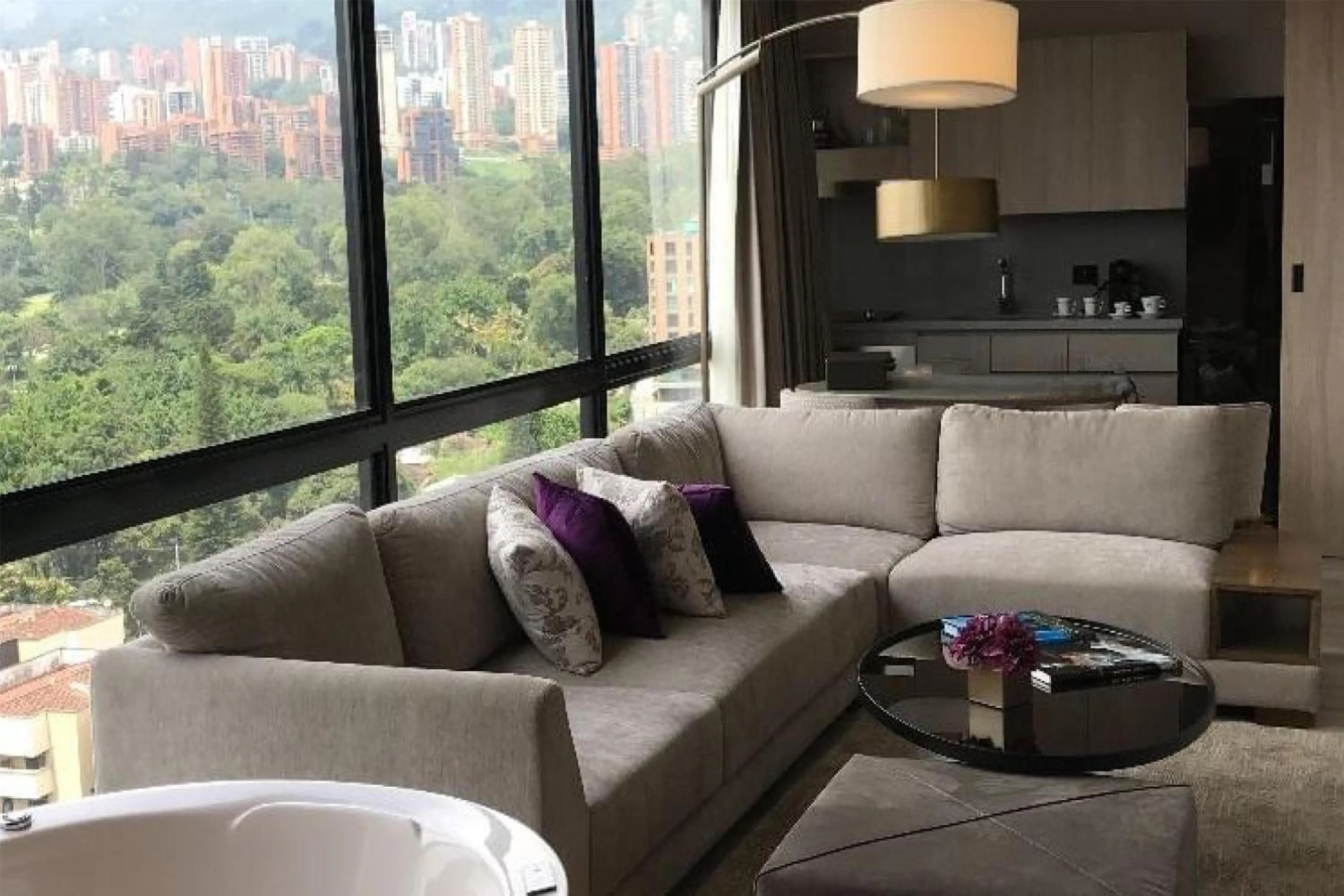 Living room in York Medellin, Curio Collection by Hilton