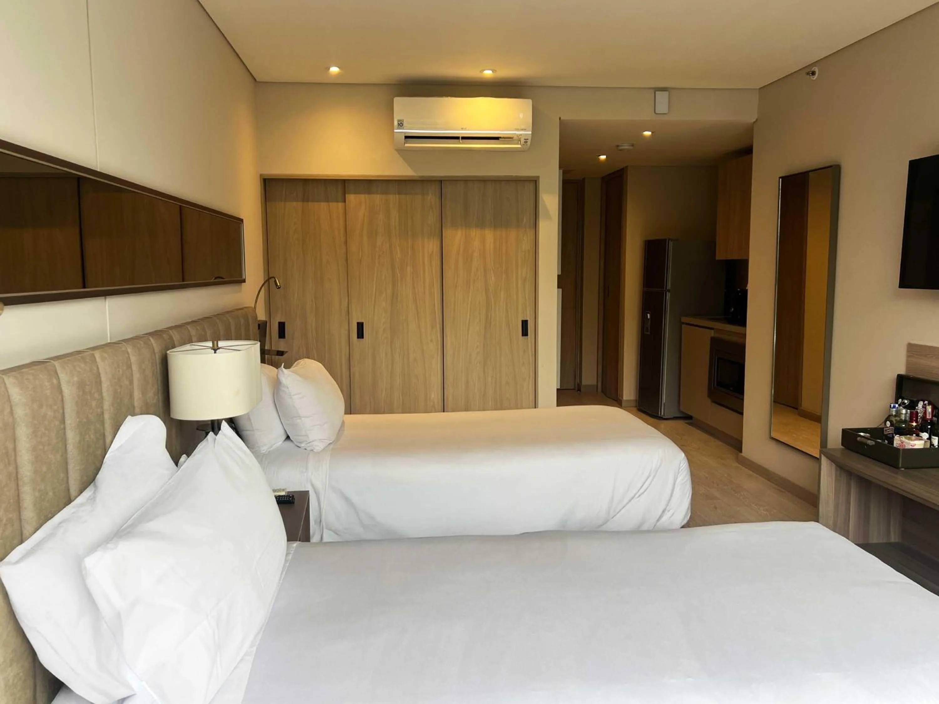 Bed in York Medellin, Curio Collection by Hilton