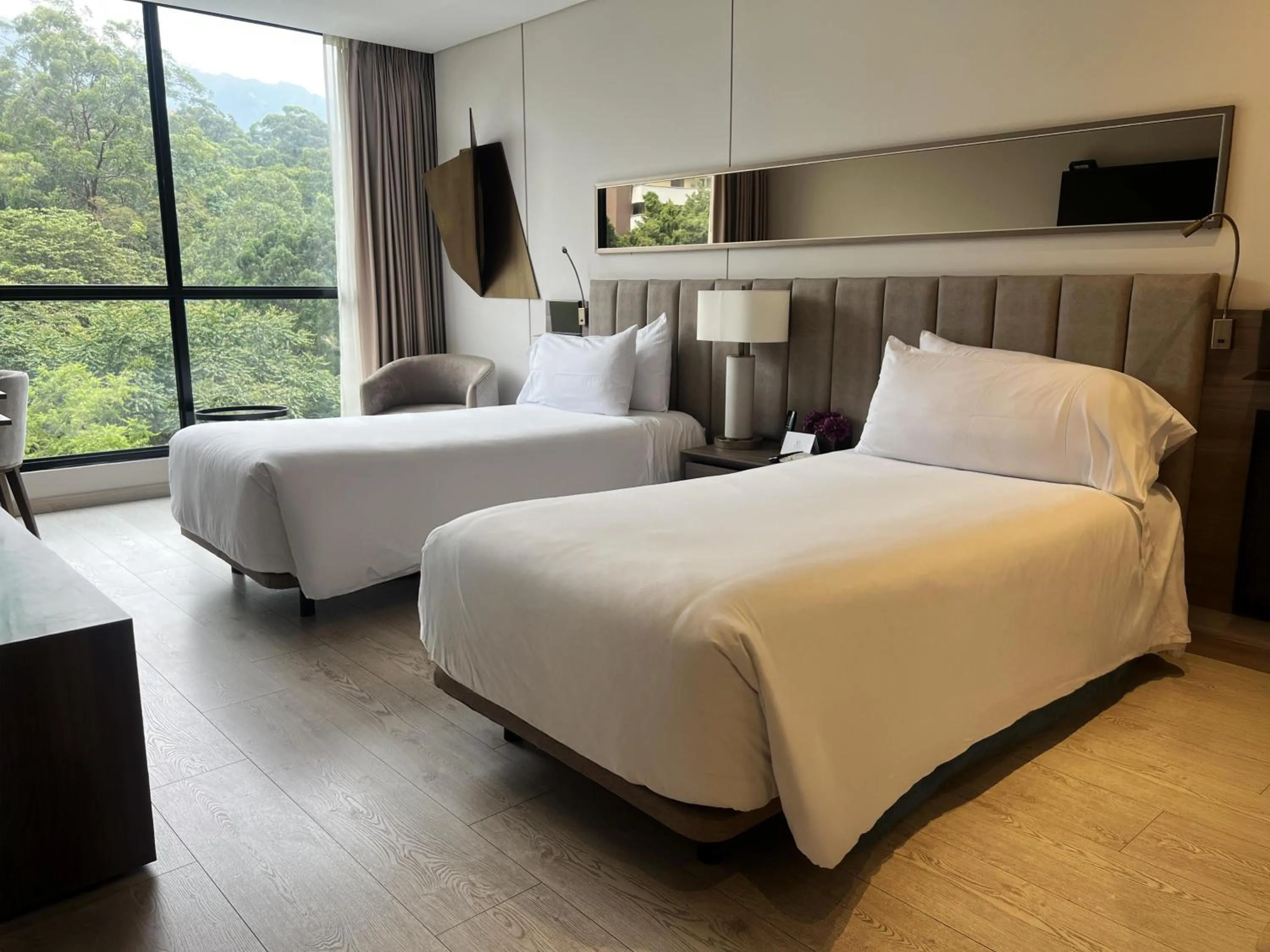 Bed in York Medellin, Curio Collection by Hilton