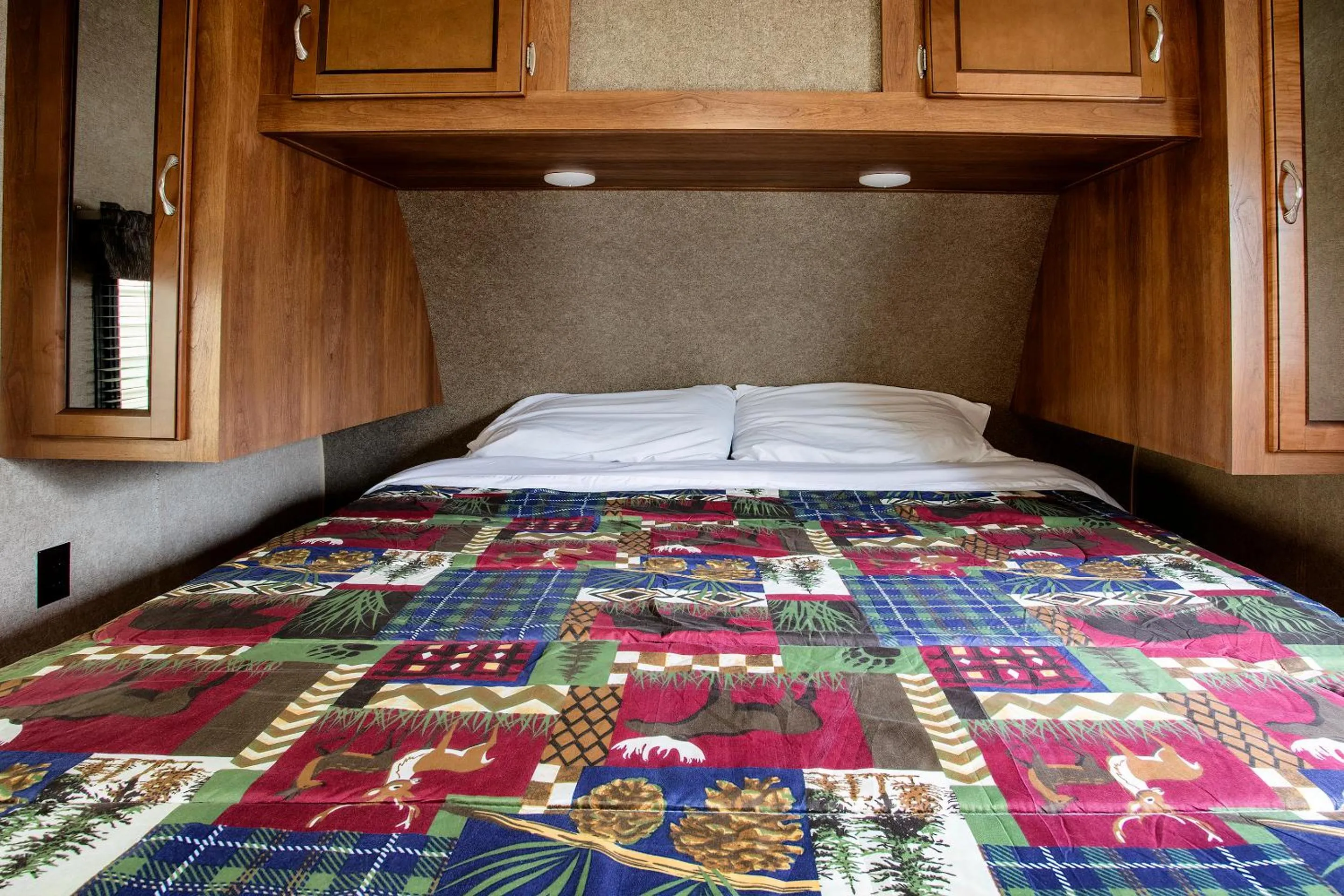 Bed in Big River Escape Riverside Cabins