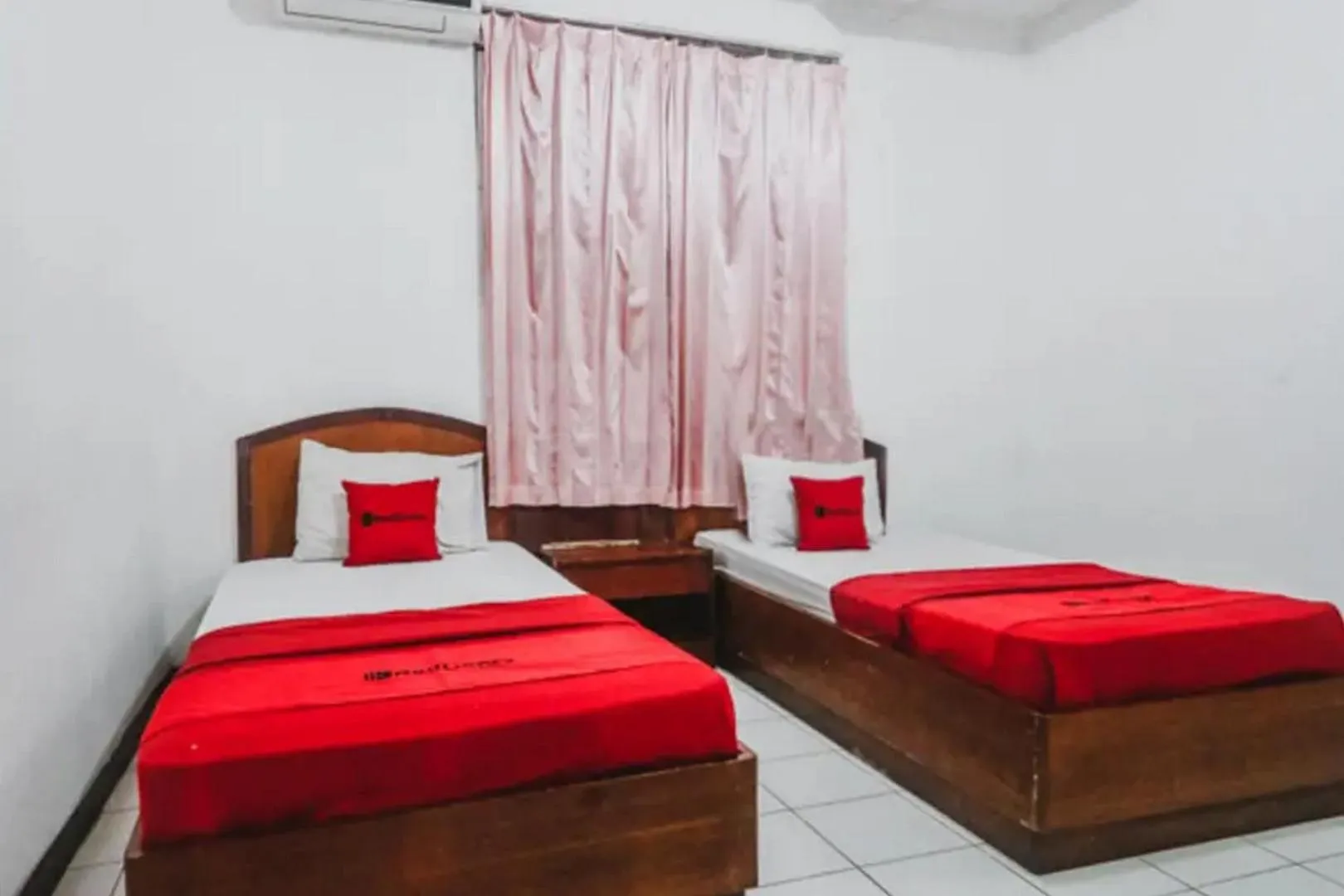Bedroom, Bed in RedDoorz Plus at Neo Asri Hotel Megamendung Puncak Bogor