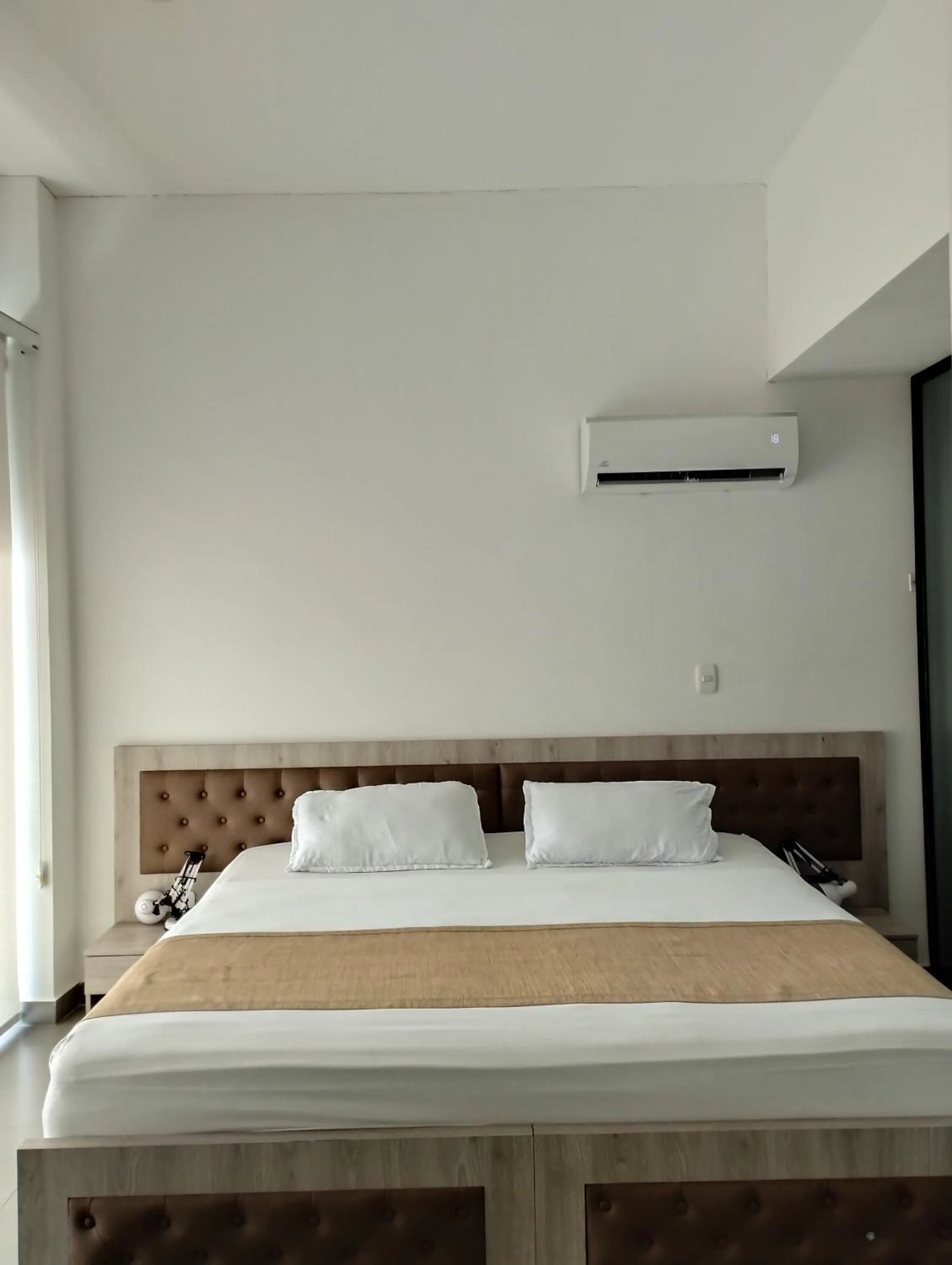 Bed in Berilo Deluxe Apartahotel