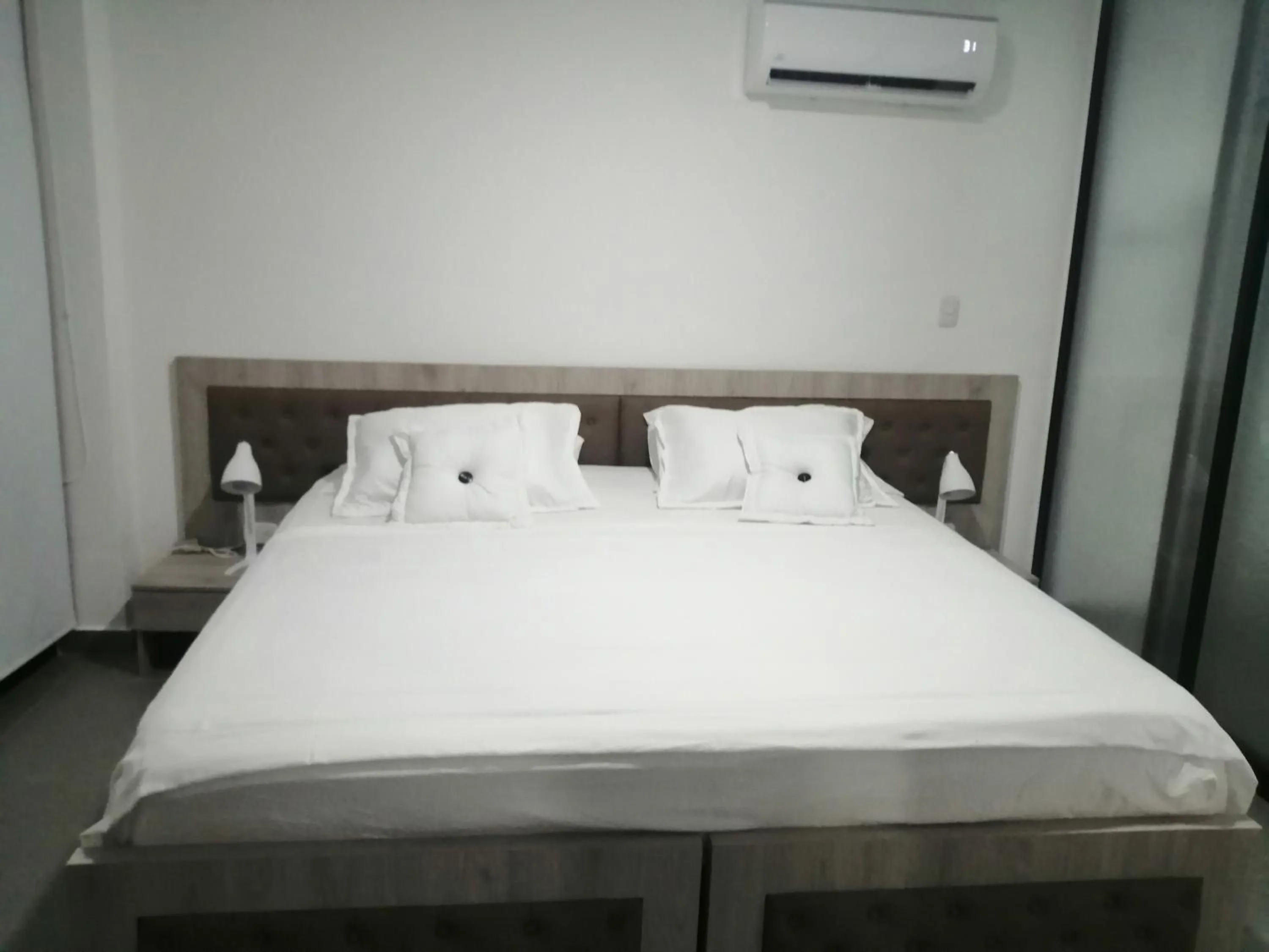 Bed in Berilo Deluxe Apartahotel