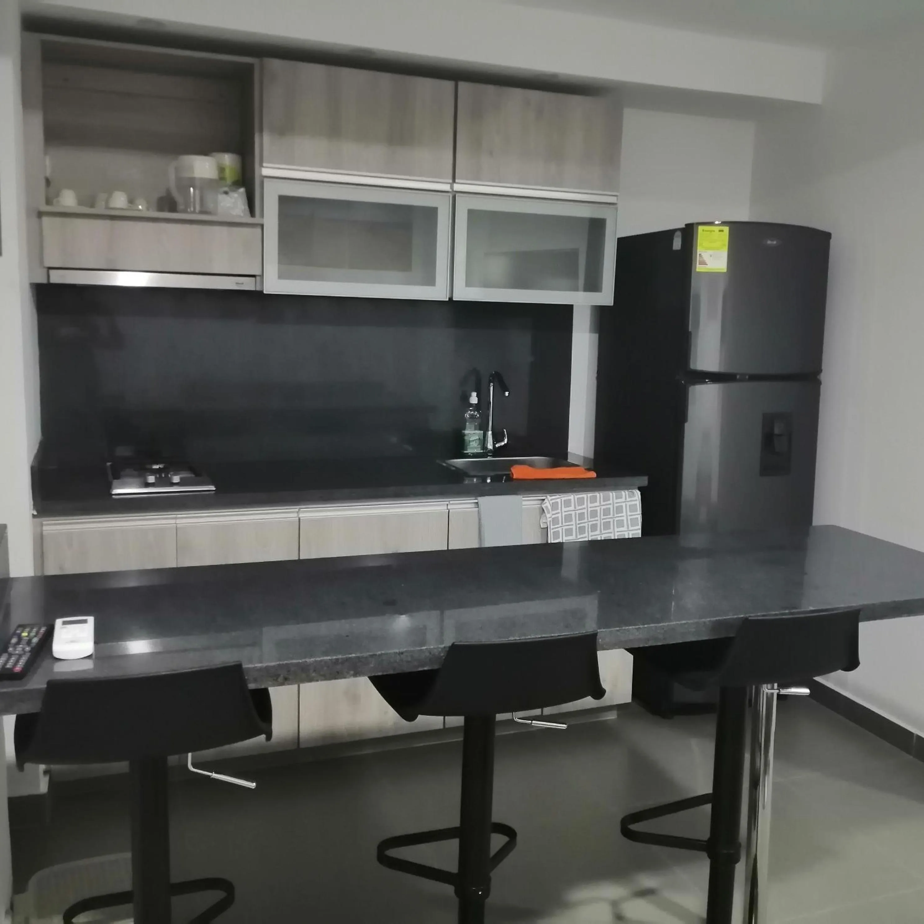 Kitchen or kitchenette in Berilo Deluxe Apartahotel