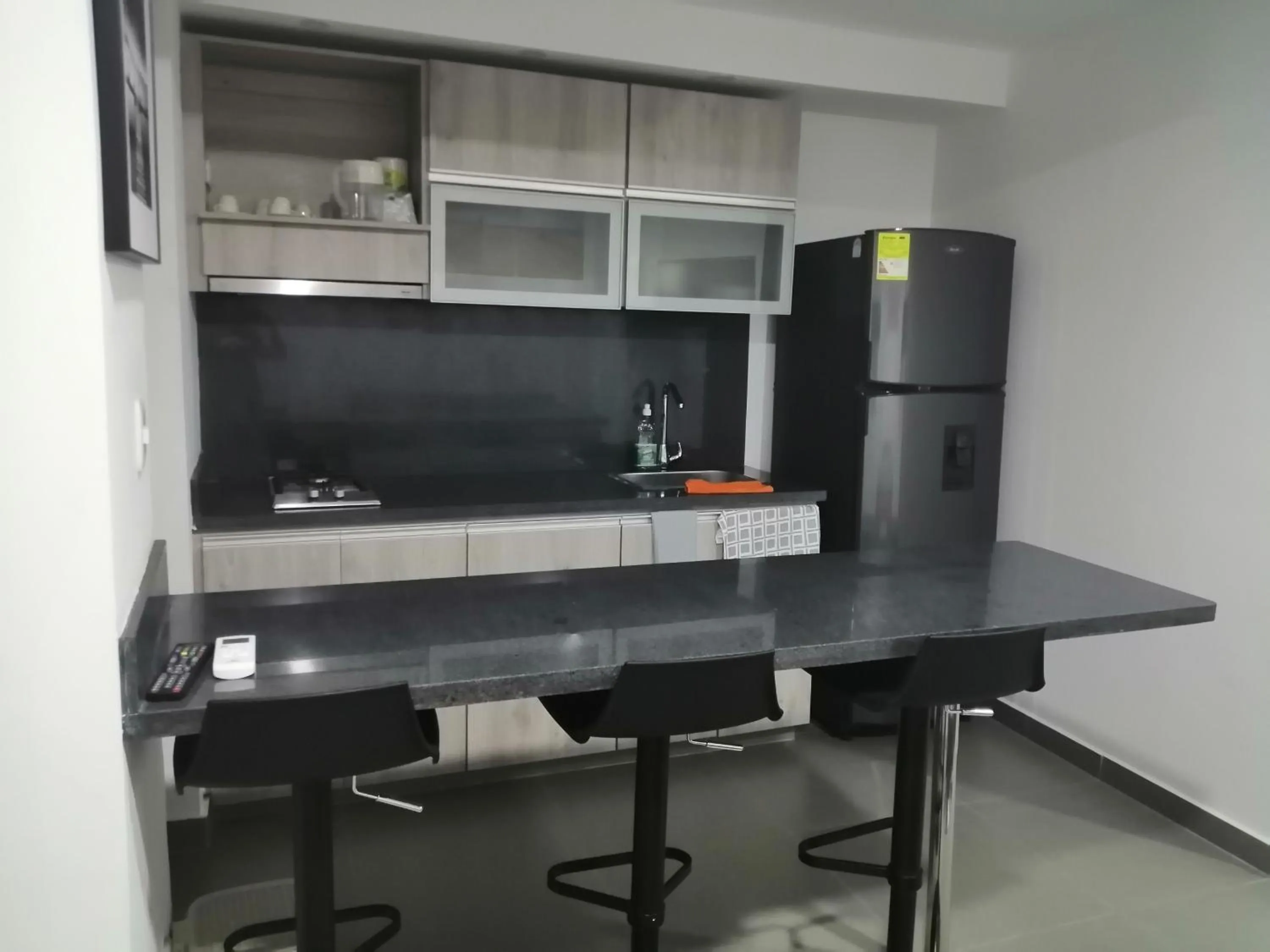 Kitchen or kitchenette in Berilo Deluxe Apartahotel