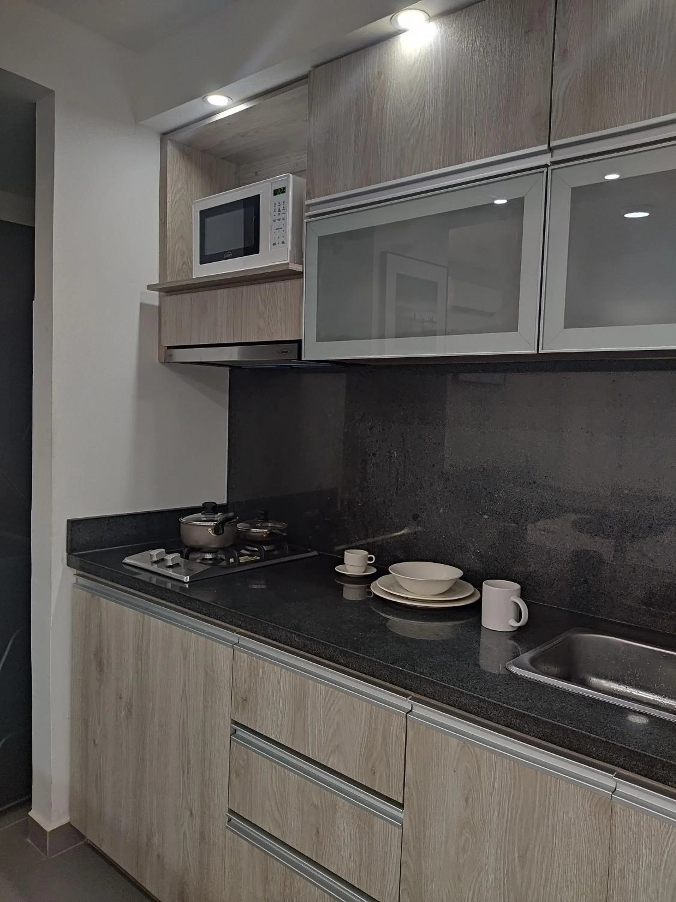 Kitchen or kitchenette in Berilo Deluxe Apartahotel