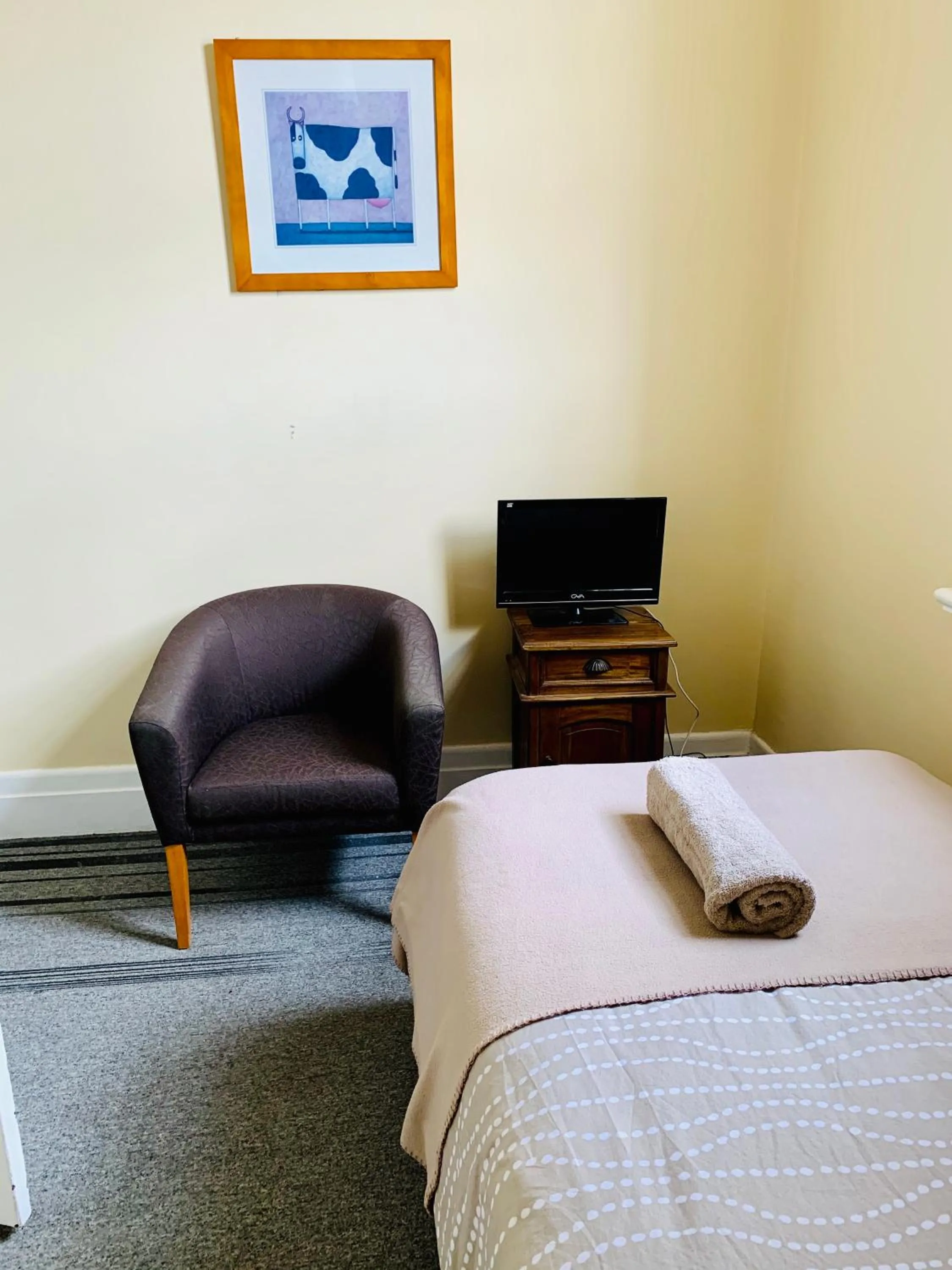 Bed in Riverside Hotel