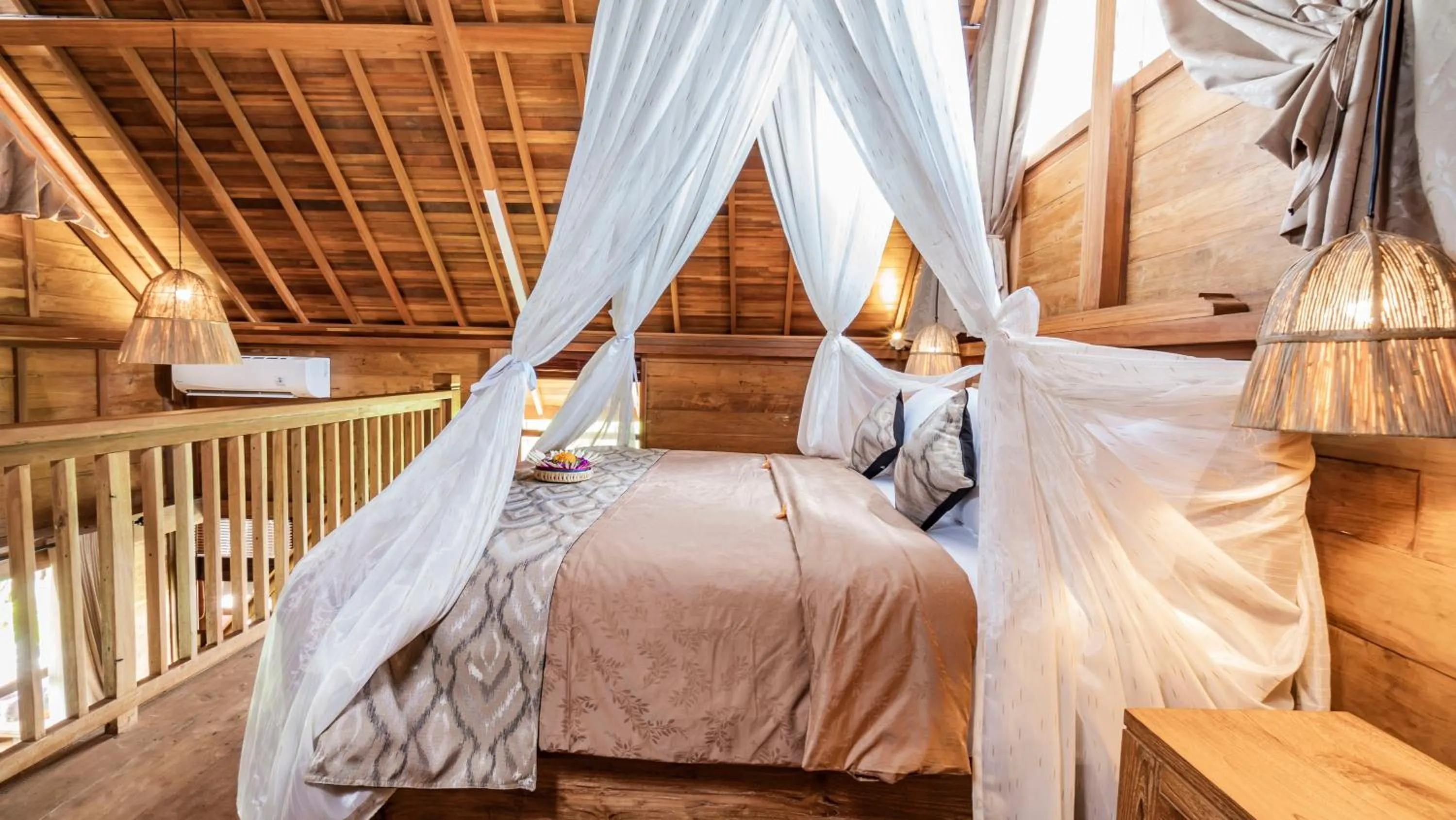 Bed in Kirani Joglo Villa Bali by Mahaputra