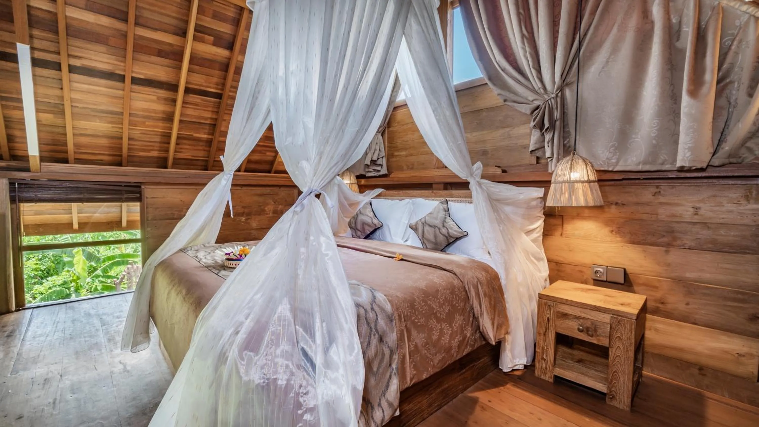 Bed in Kirani Joglo Villa Bali by Mahaputra