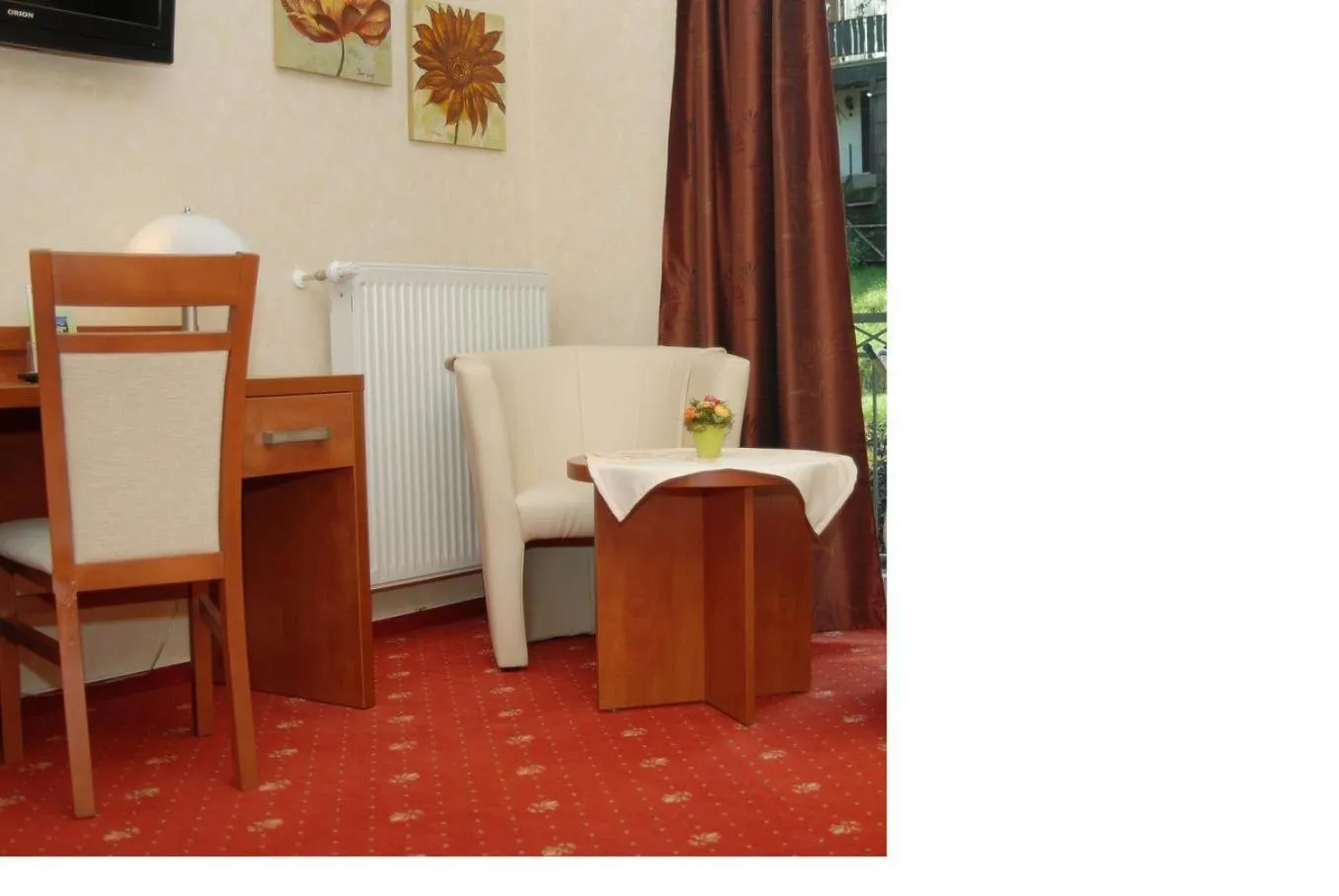 Seating area in Hotel-Restaurant Laux